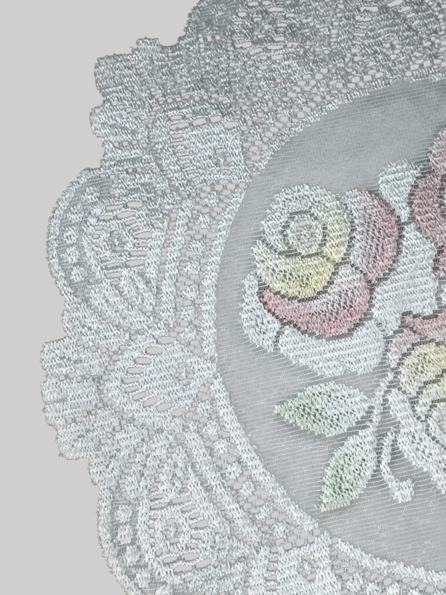 Vintage round lace doily with rose design