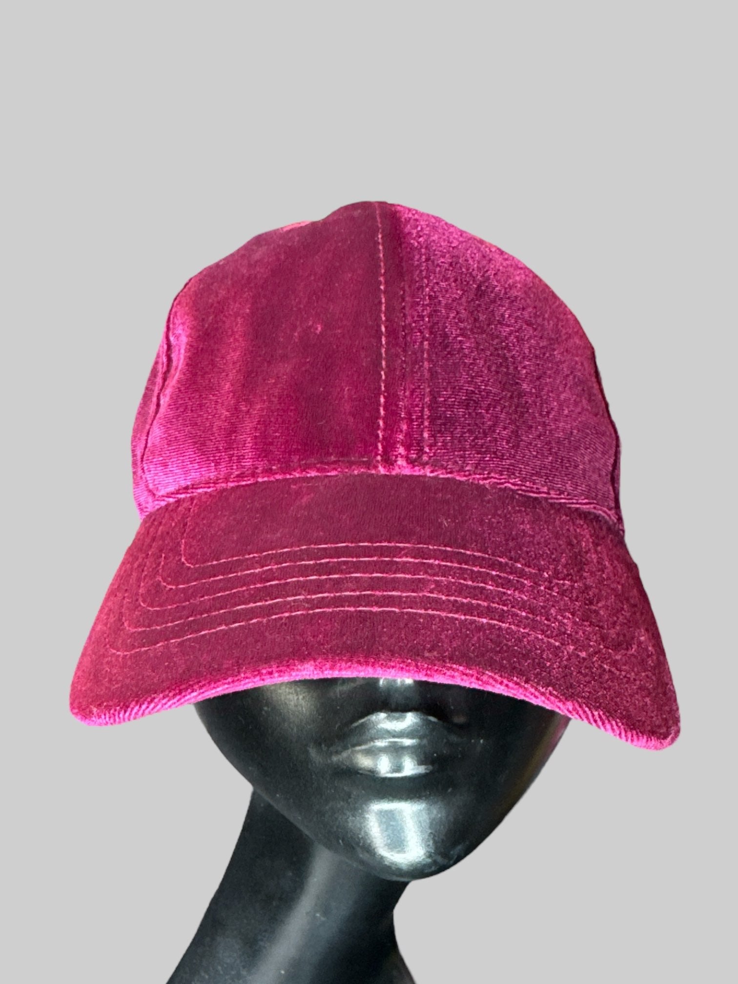 Maroon velvet baseball cap with brass tone buckle