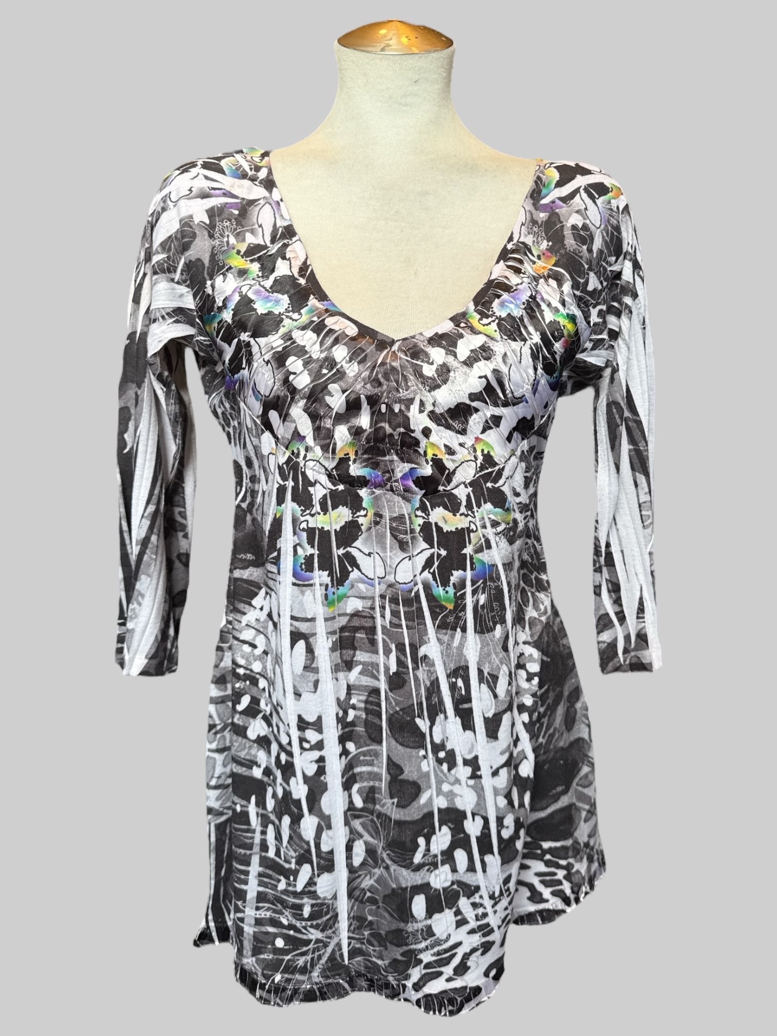 L Tunic style top with black, white, and rainbow designs and 3/4 sleeves