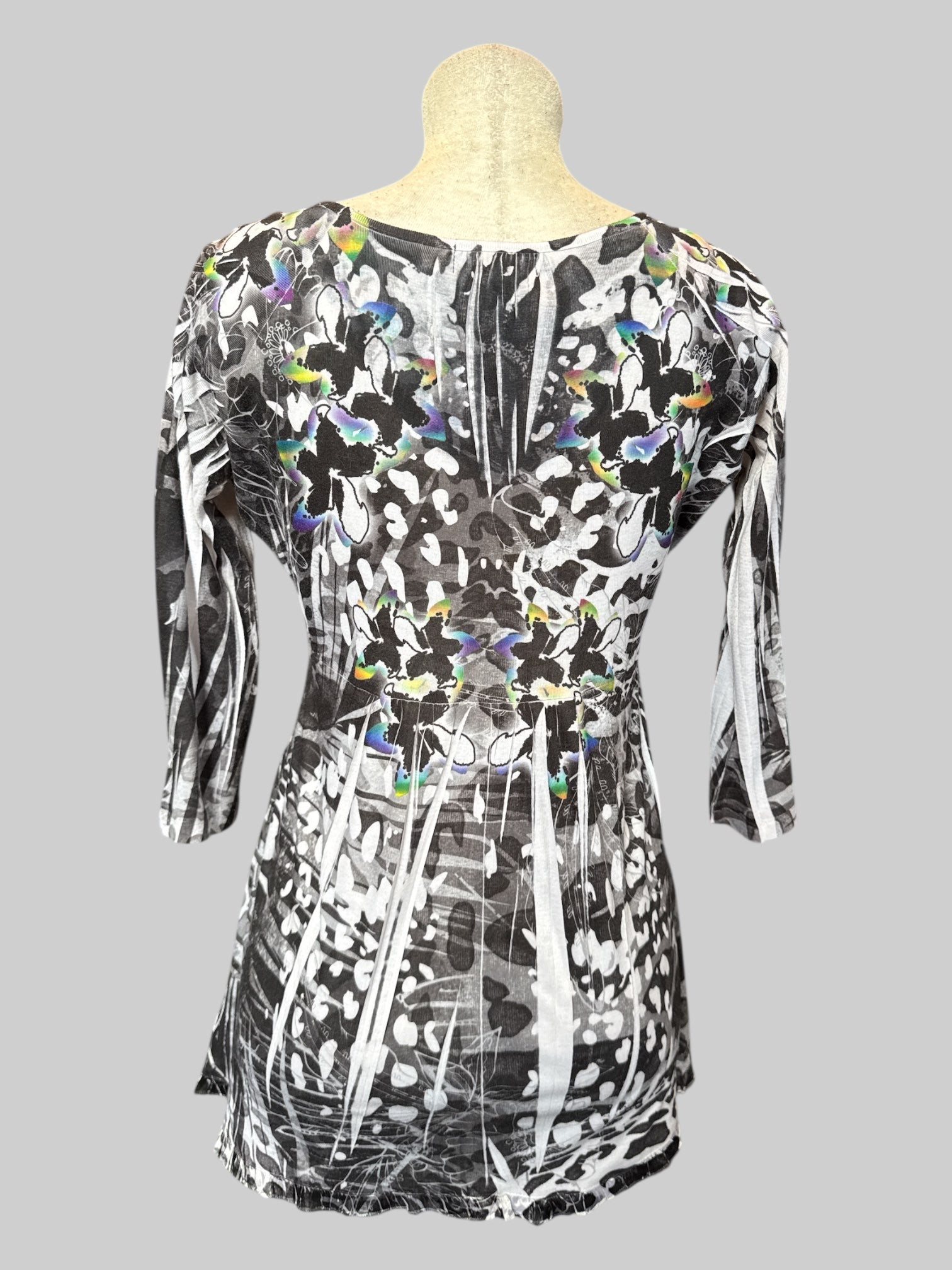 L Tunic style top with black, white, and rainbow designs and 3/4 sleeves