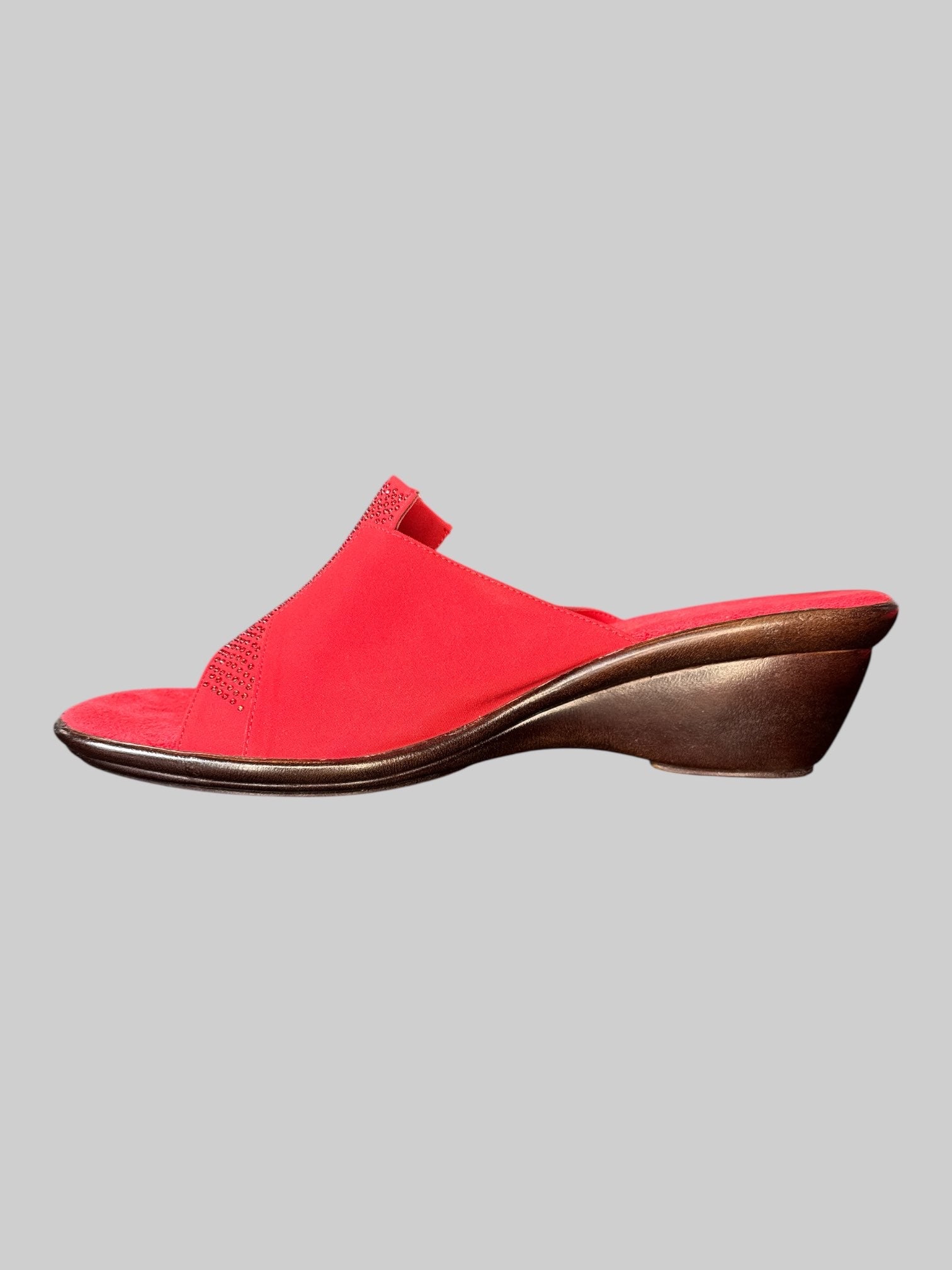 Size 6 Red open toe wedges with fuzzy sole and rhinestone detail