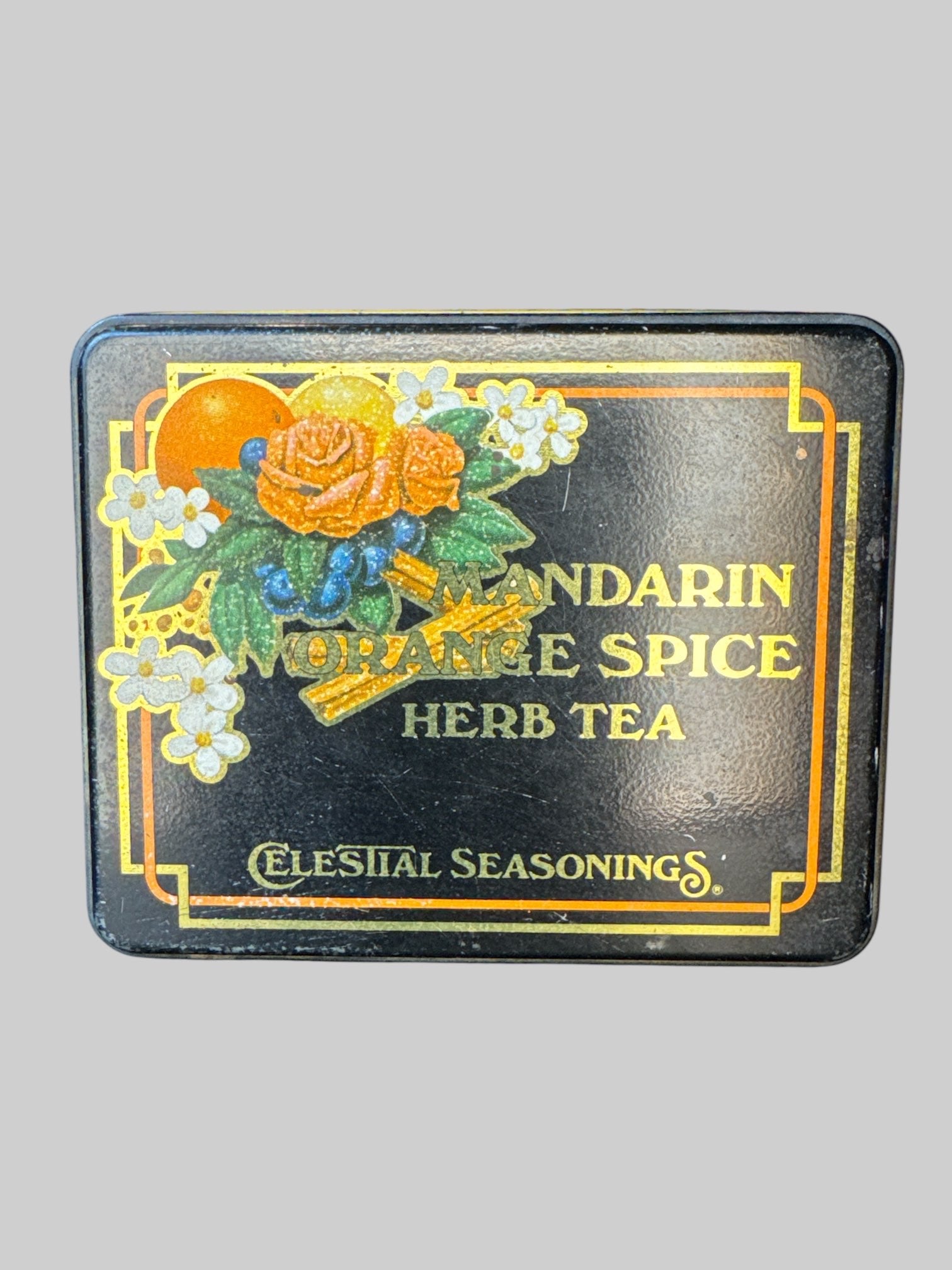 Vintage metal tea tin with gold tone inside
