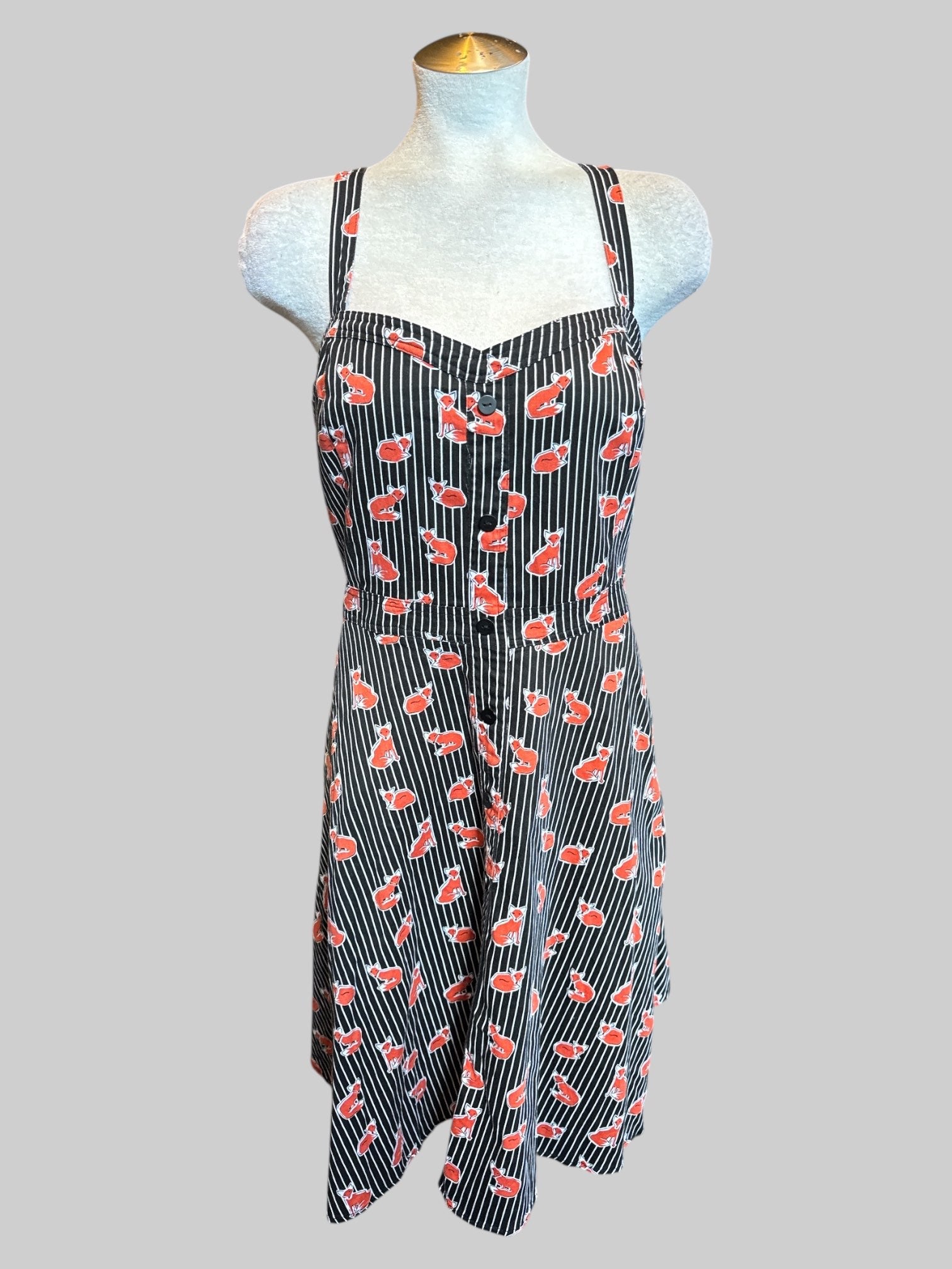 1X Black and white striped sleeveless dress with red fox print, phone buttons on front, shirred back, and pockets