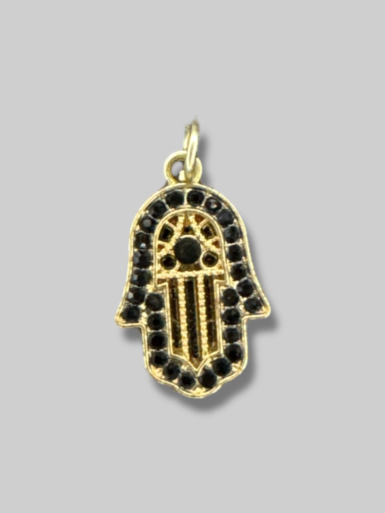 Black beaded necklace with hasma hand pendant