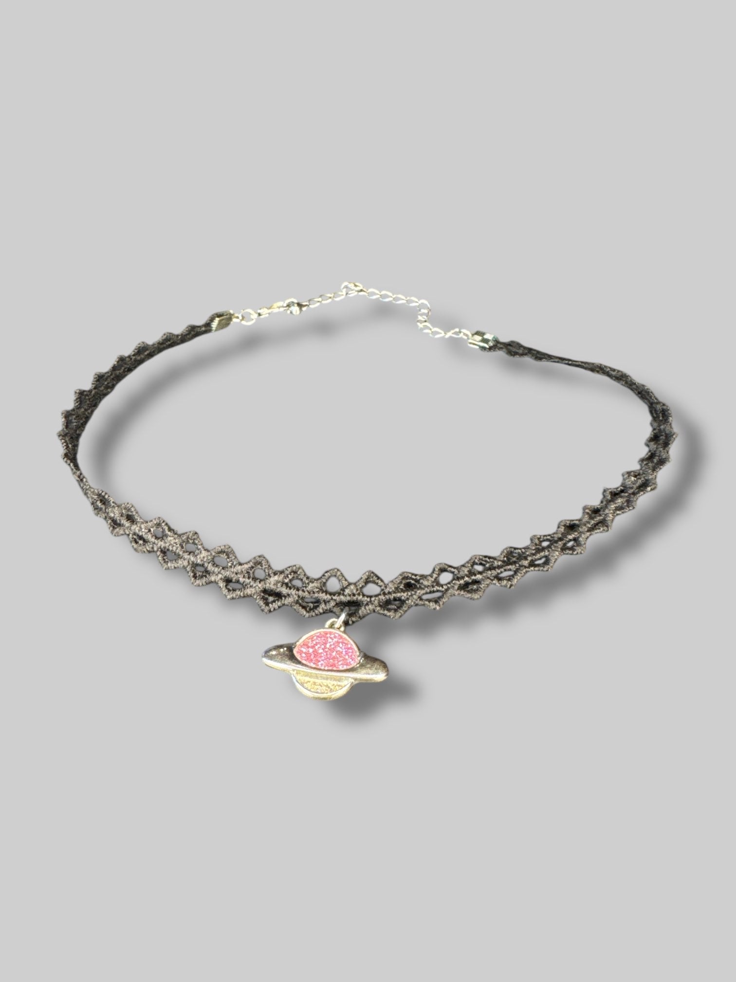Black choker with Saturn pendant