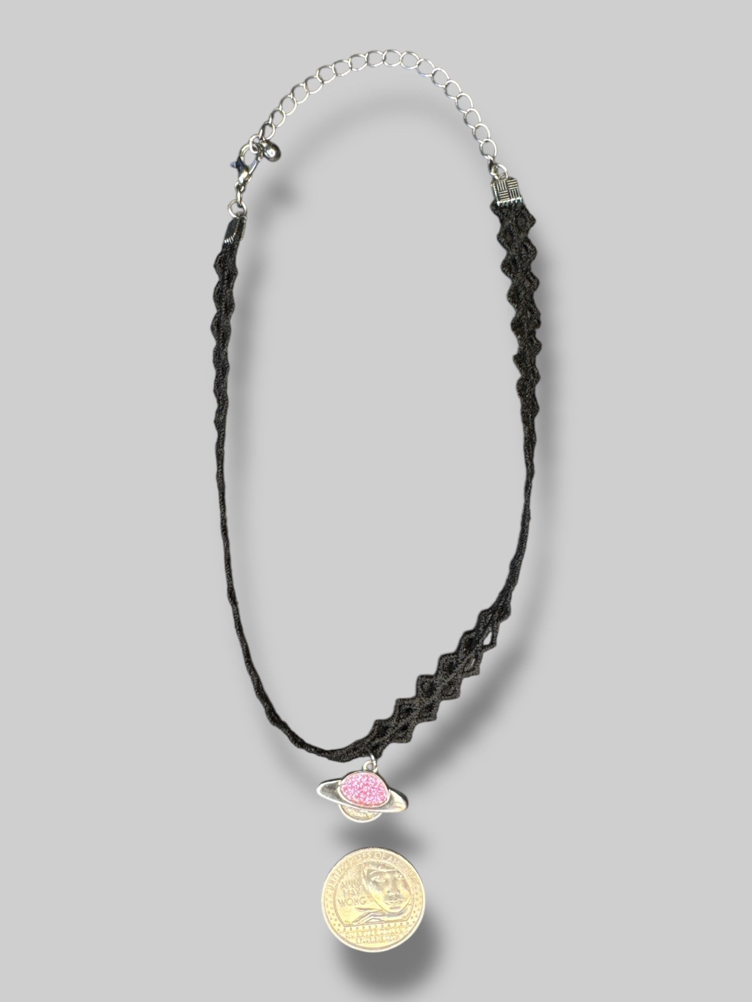 Black choker with Saturn pendant