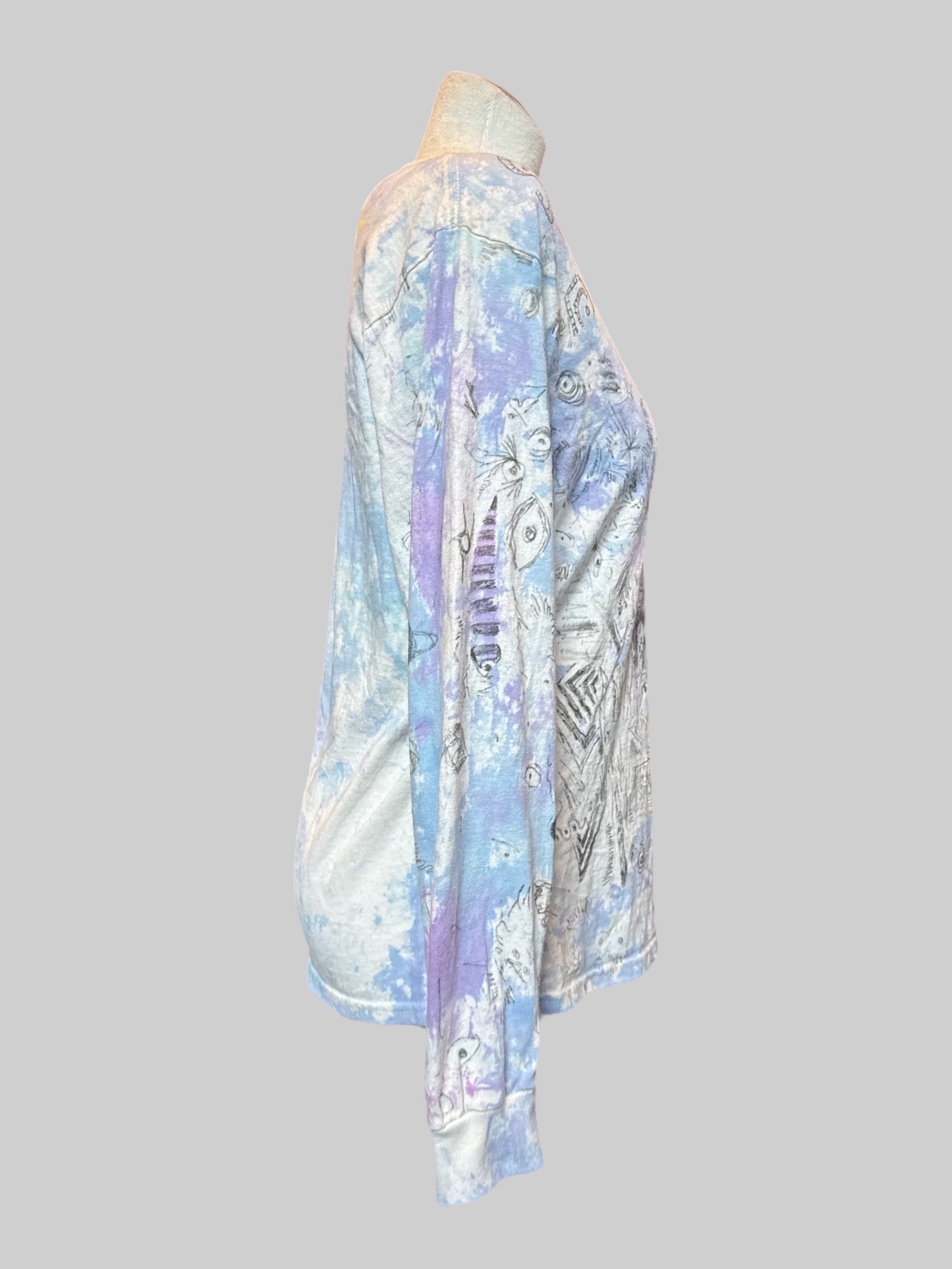 M Long sleeve blue, purple, and white tie dye shirt with art by Kevin Emerson