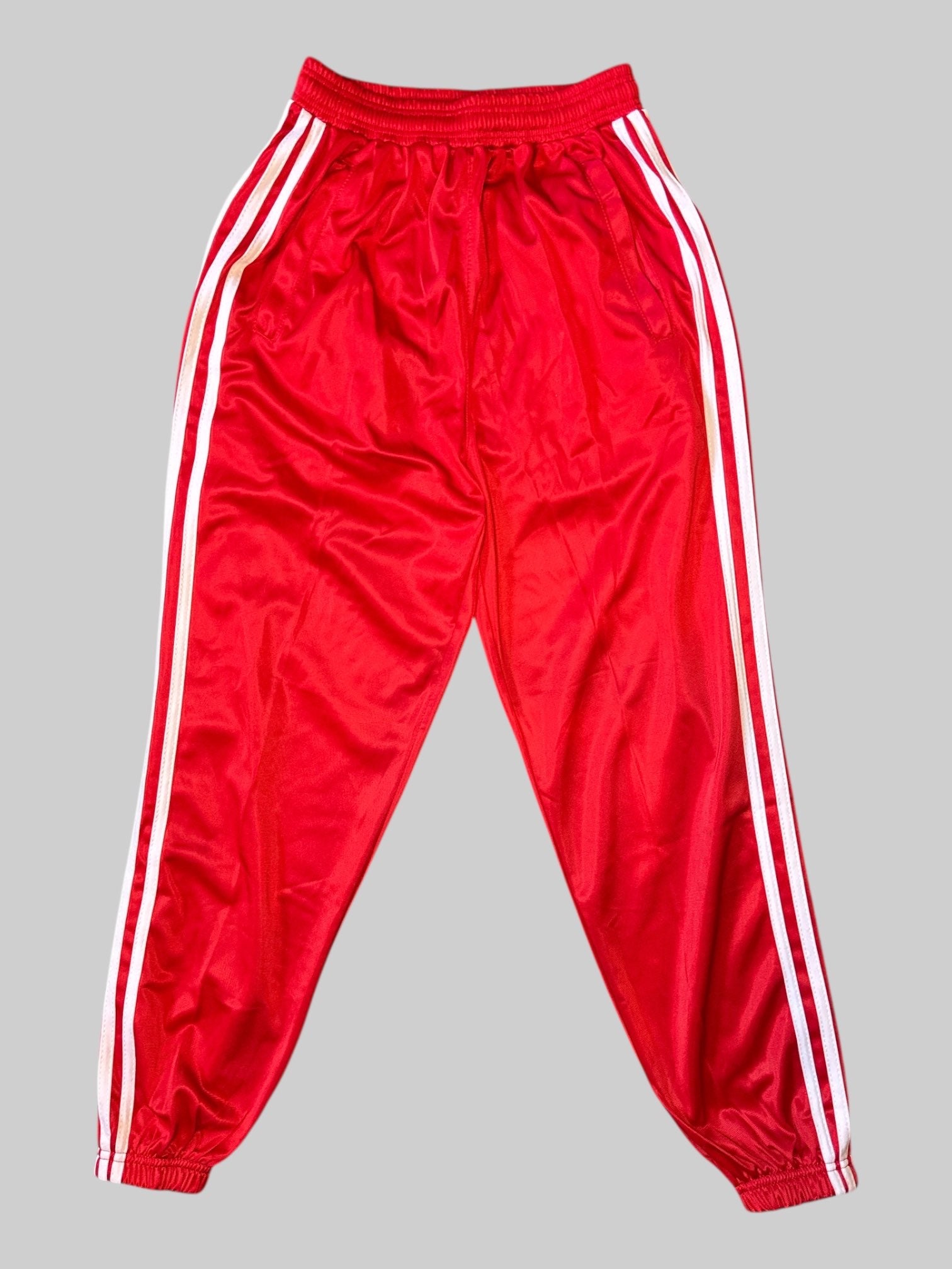 M Red track pants with white stripes, and tear away buttons