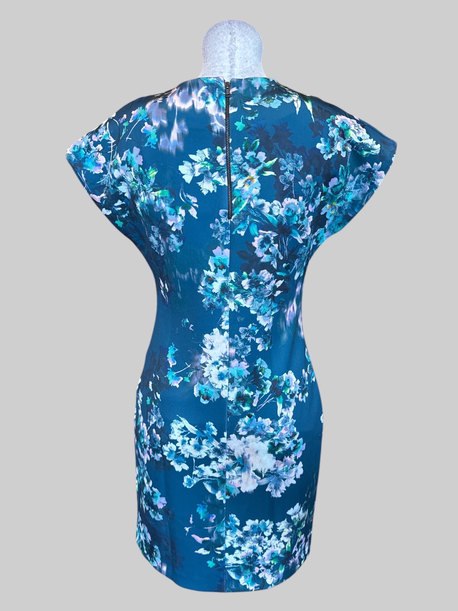 L Teal short sleeve dress with blurred, botanical design and zipper on back