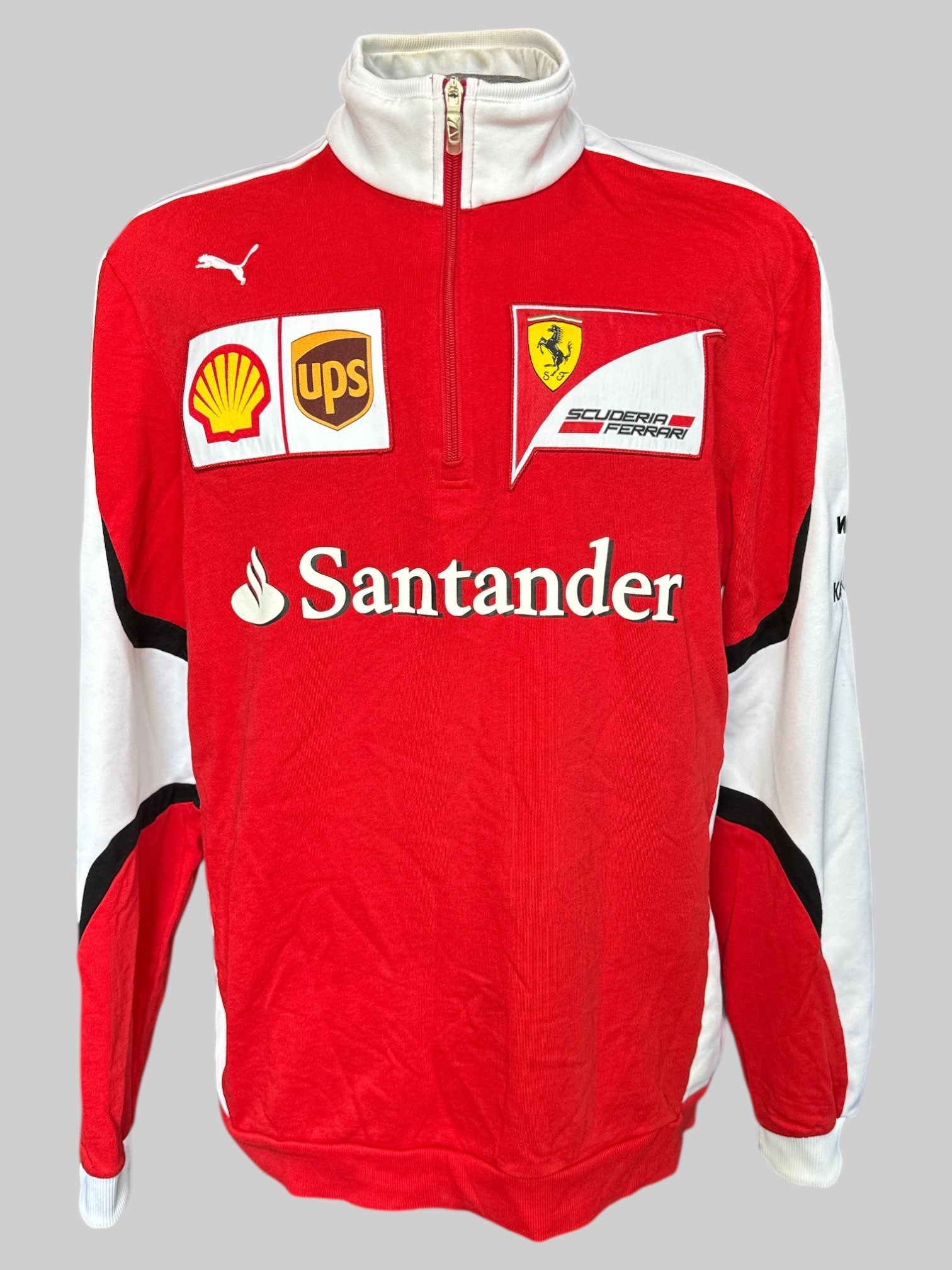 XL Red and white racing jacket with sponsor patches, and some small sweat stains