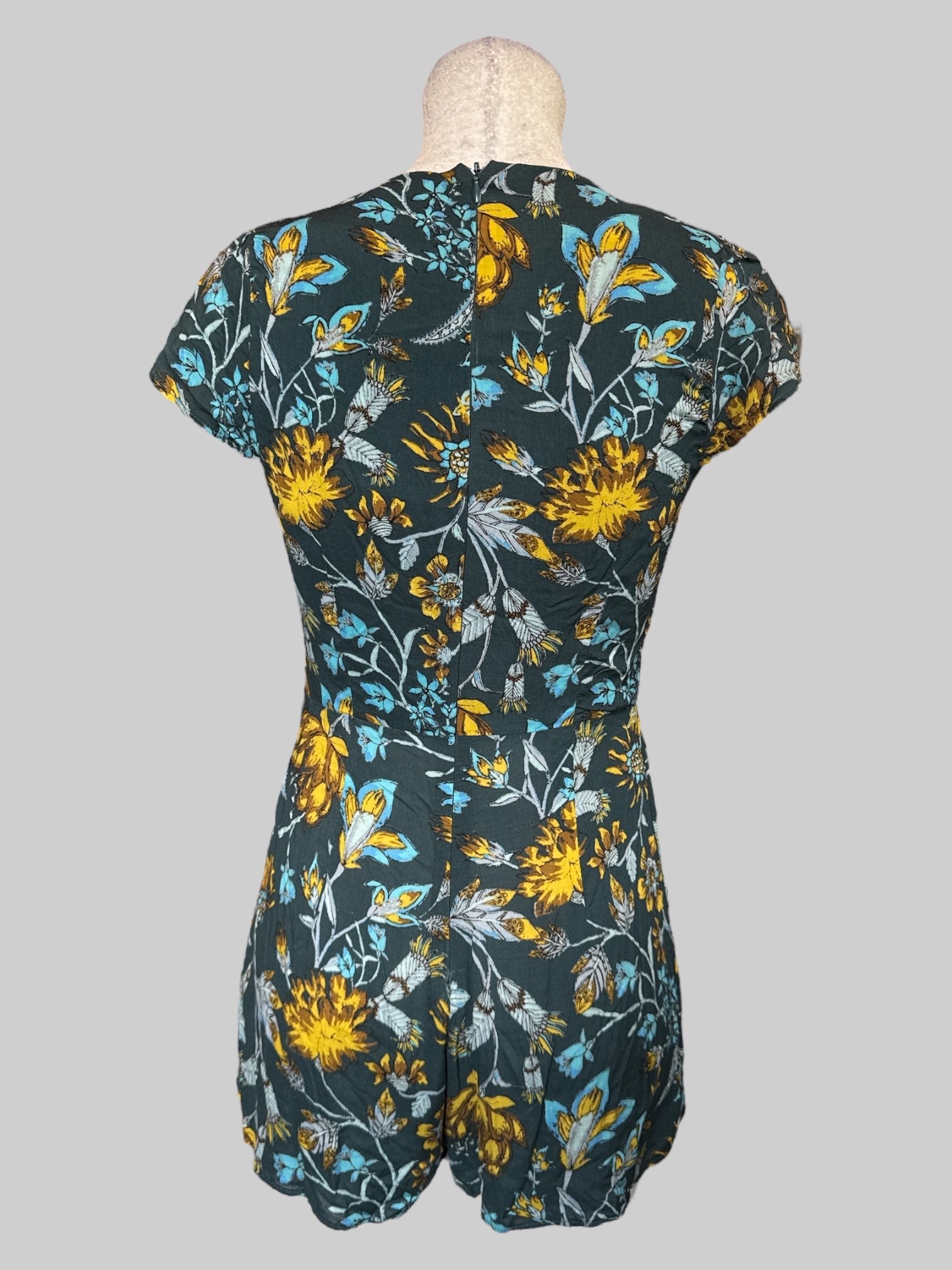 S Teal floral short sleeve faux wrap romper with zipper on back