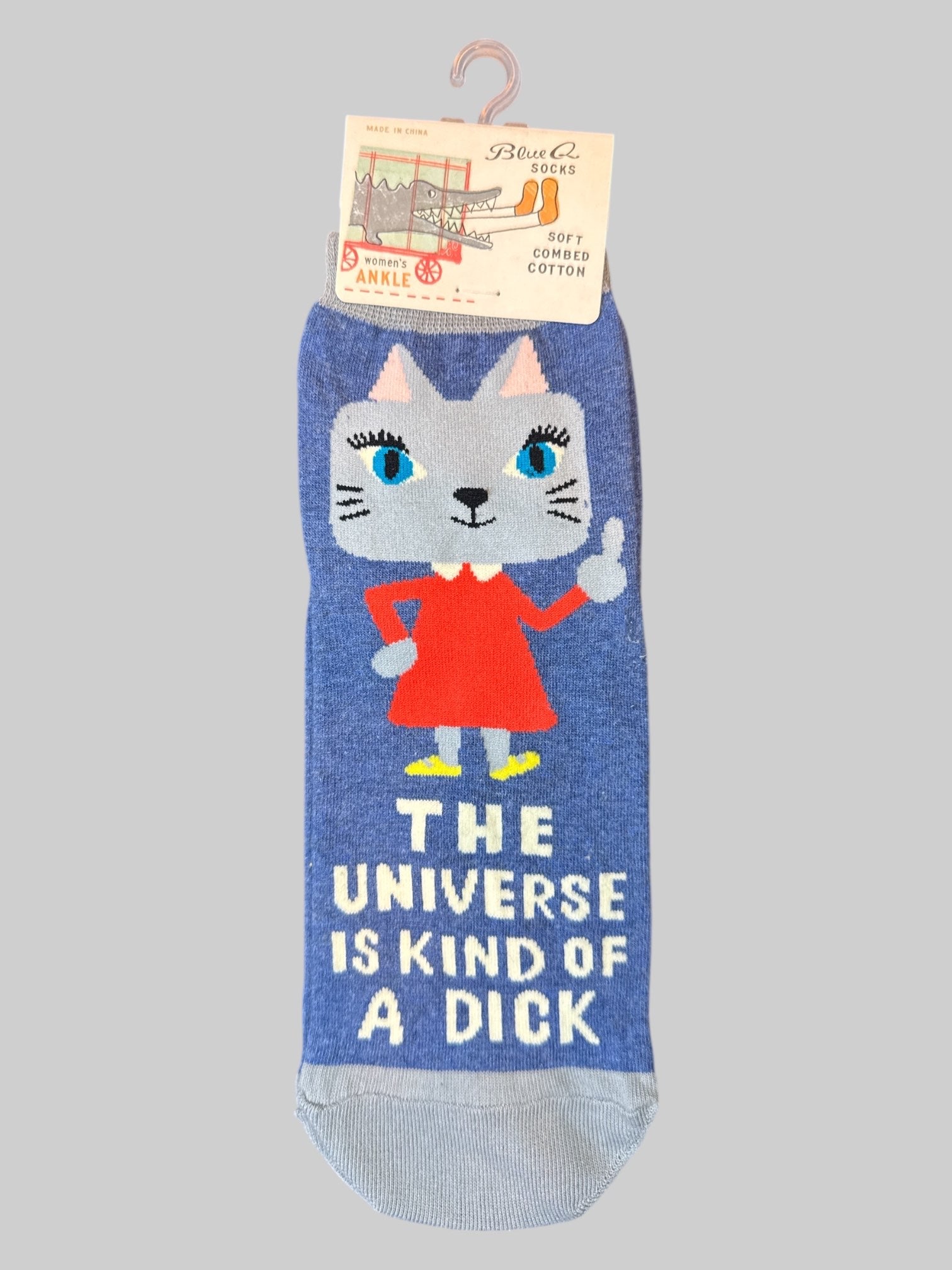 Size 5-10 women blue and grey ankle socks with “The universe is kind of a dick” graphic