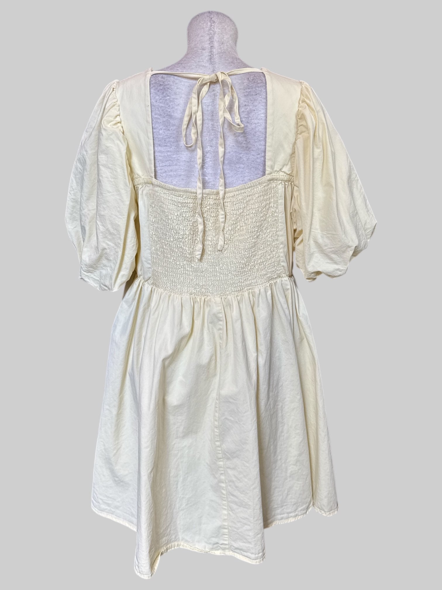 3X Light yellow short sleeve dress with mock corset, shirred back, multiple bows and balloon sleeves