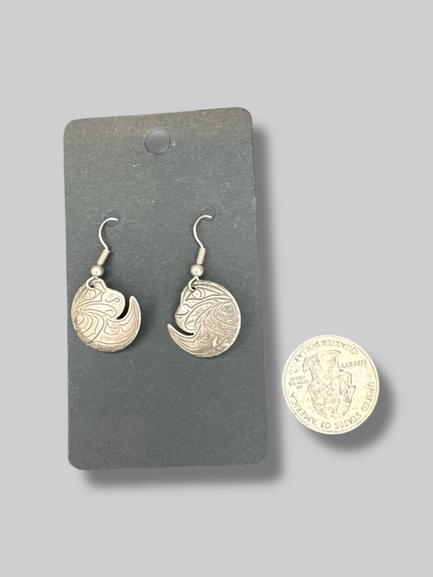 Sterling silver handmade designer earrings by artist Nancy Dawson