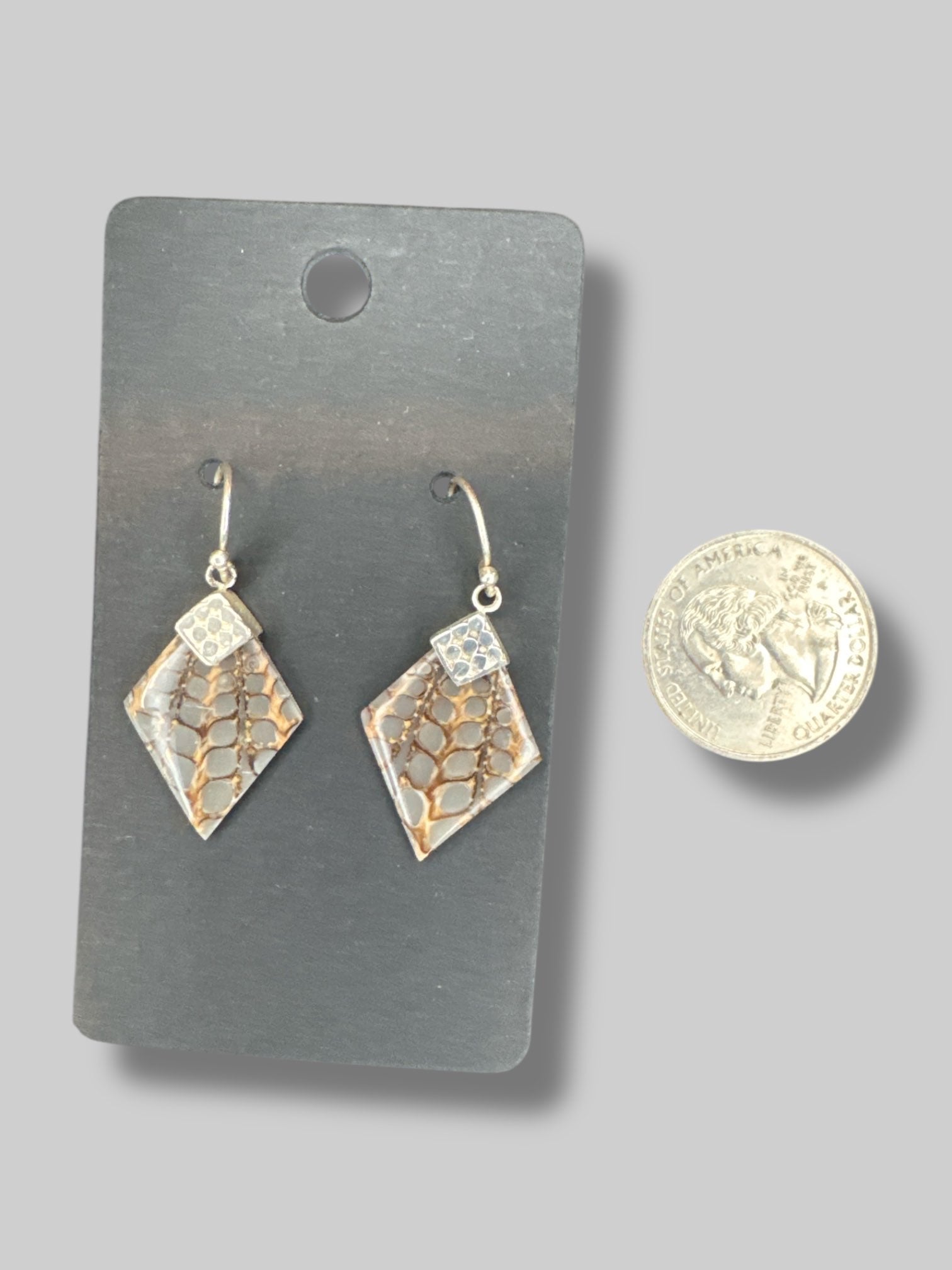 Silver tone diamond shaped gem earrings