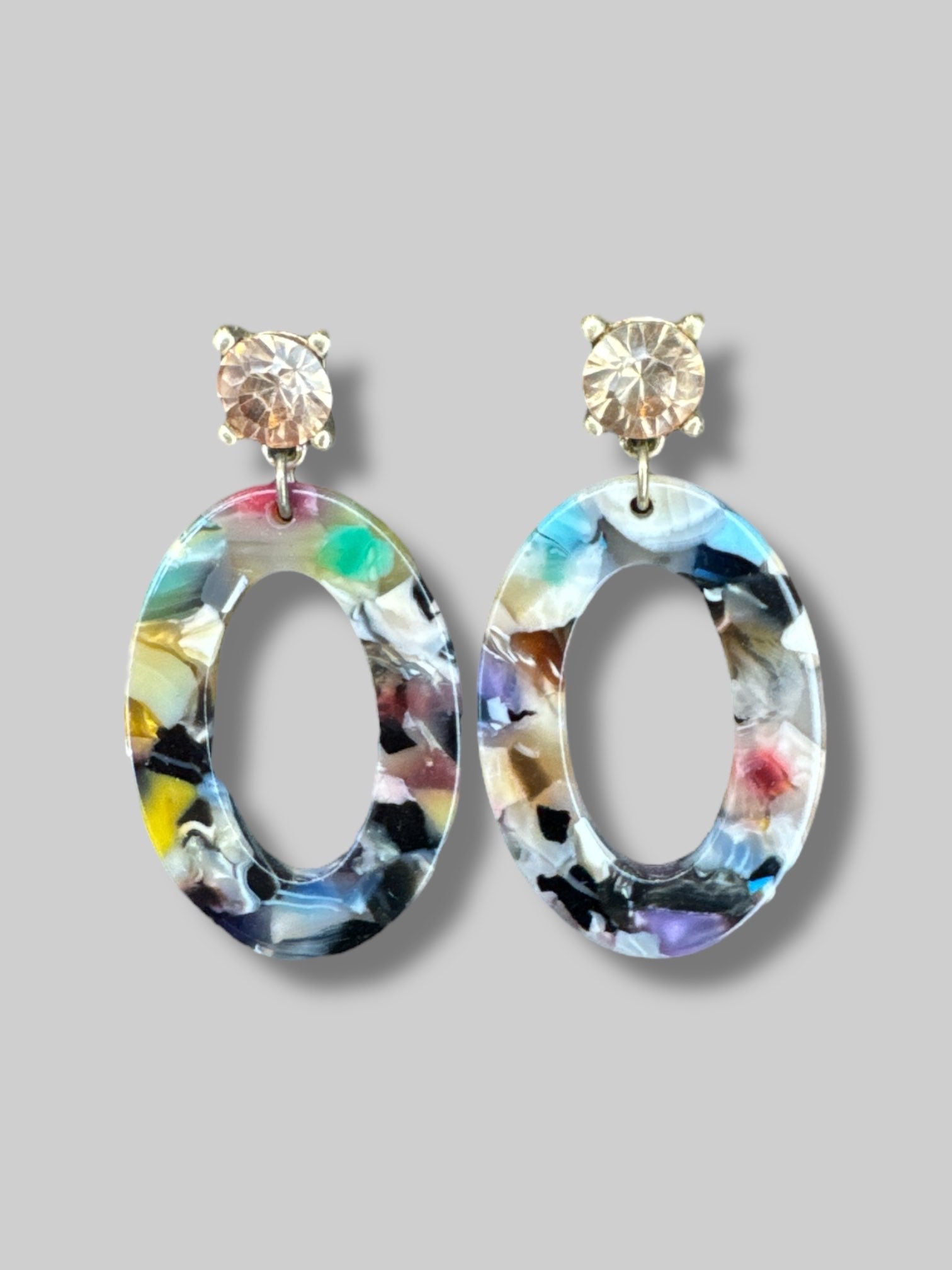 Oval colorful dangly earrings with champagne gem