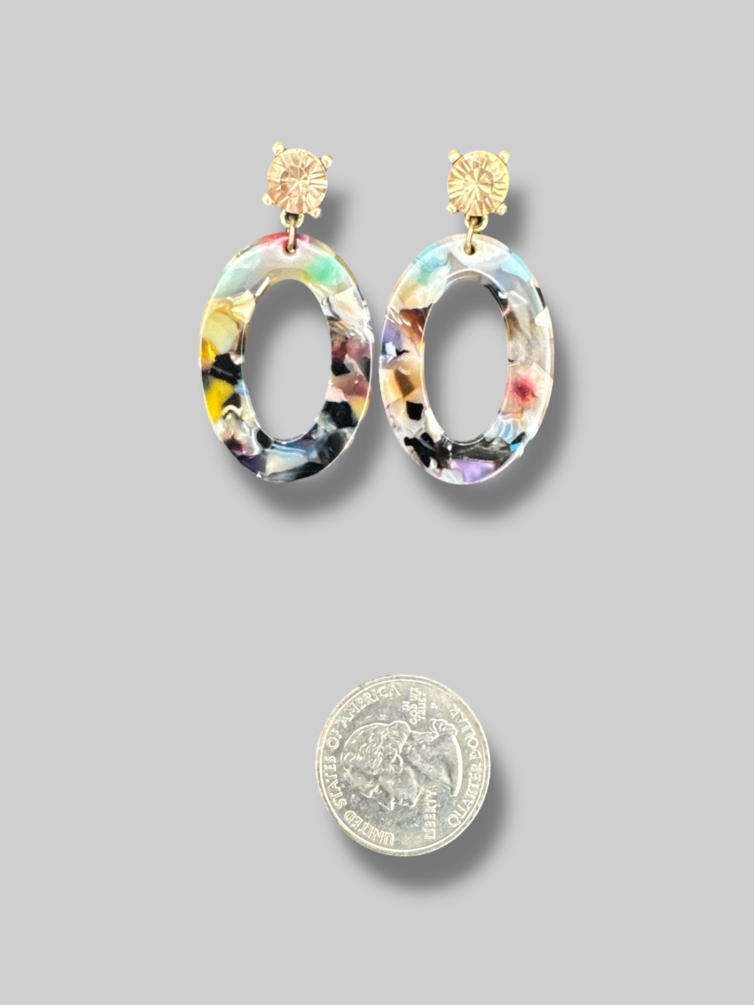 Oval colorful dangly earrings with champagne gem