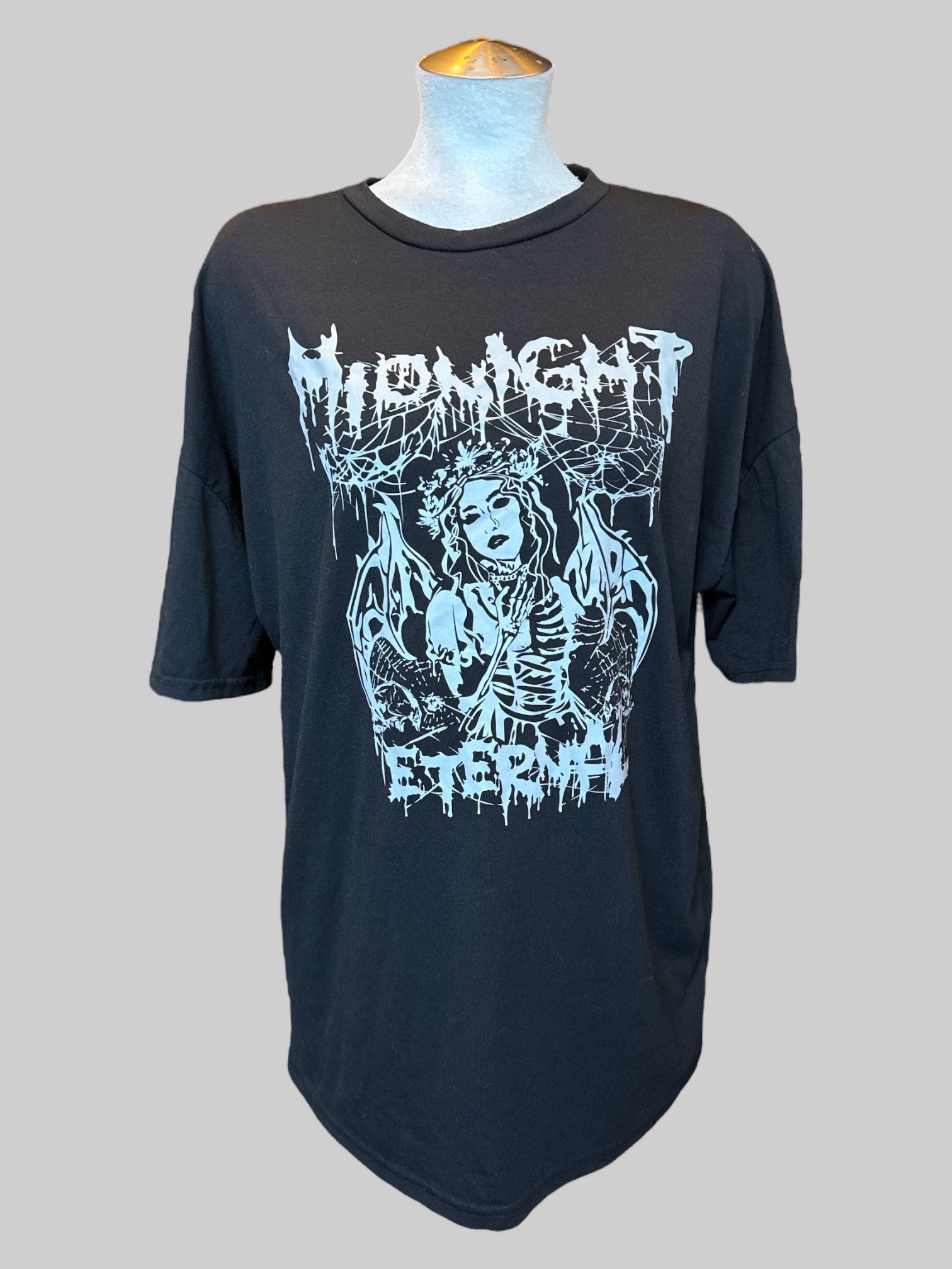 1X Black tee with “Midnight Eternal” graphic