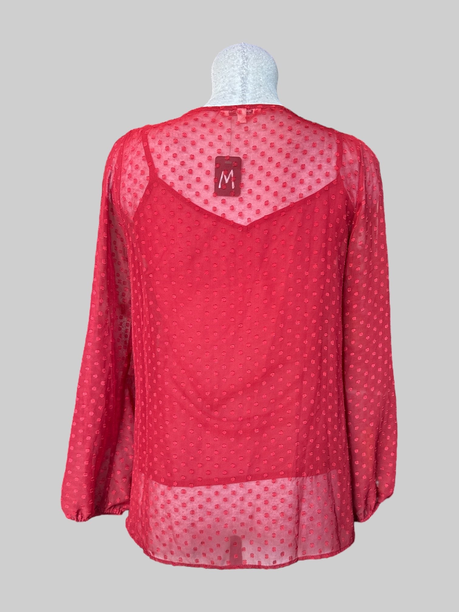 M Red long sleeve top with attached tank top, polkadots, lace detail on neckline, and balloon sleeves