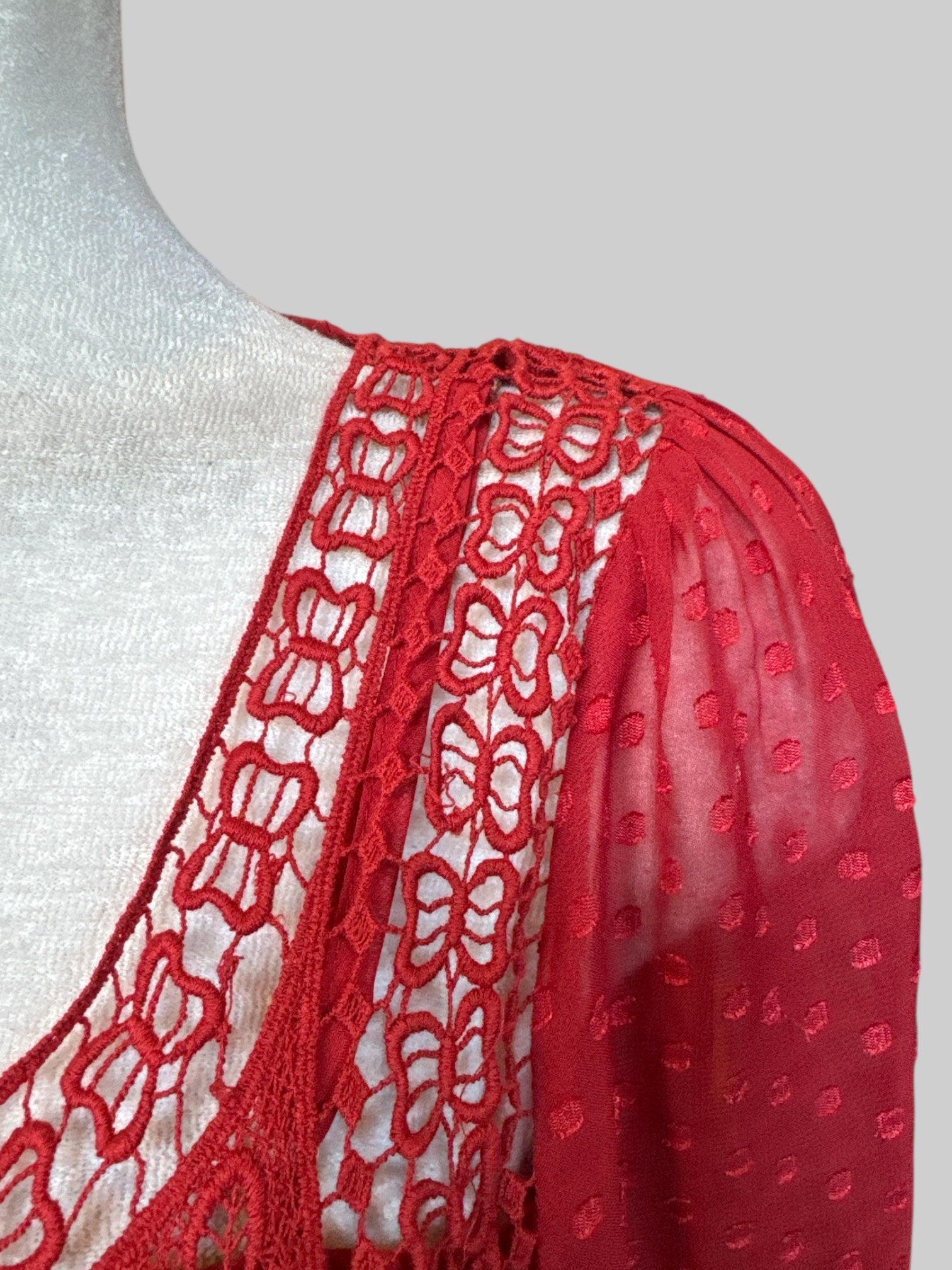 M Red long sleeve top with attached tank top, polkadots, lace detail on neckline, and balloon sleeves