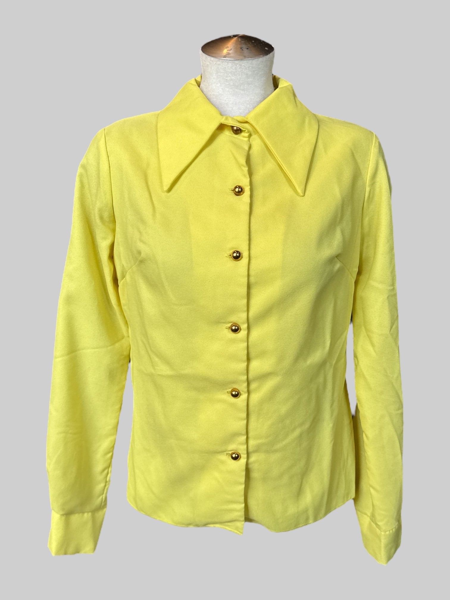 M Yellow long sleeve button-down top with pointy collar and brass tone buttons