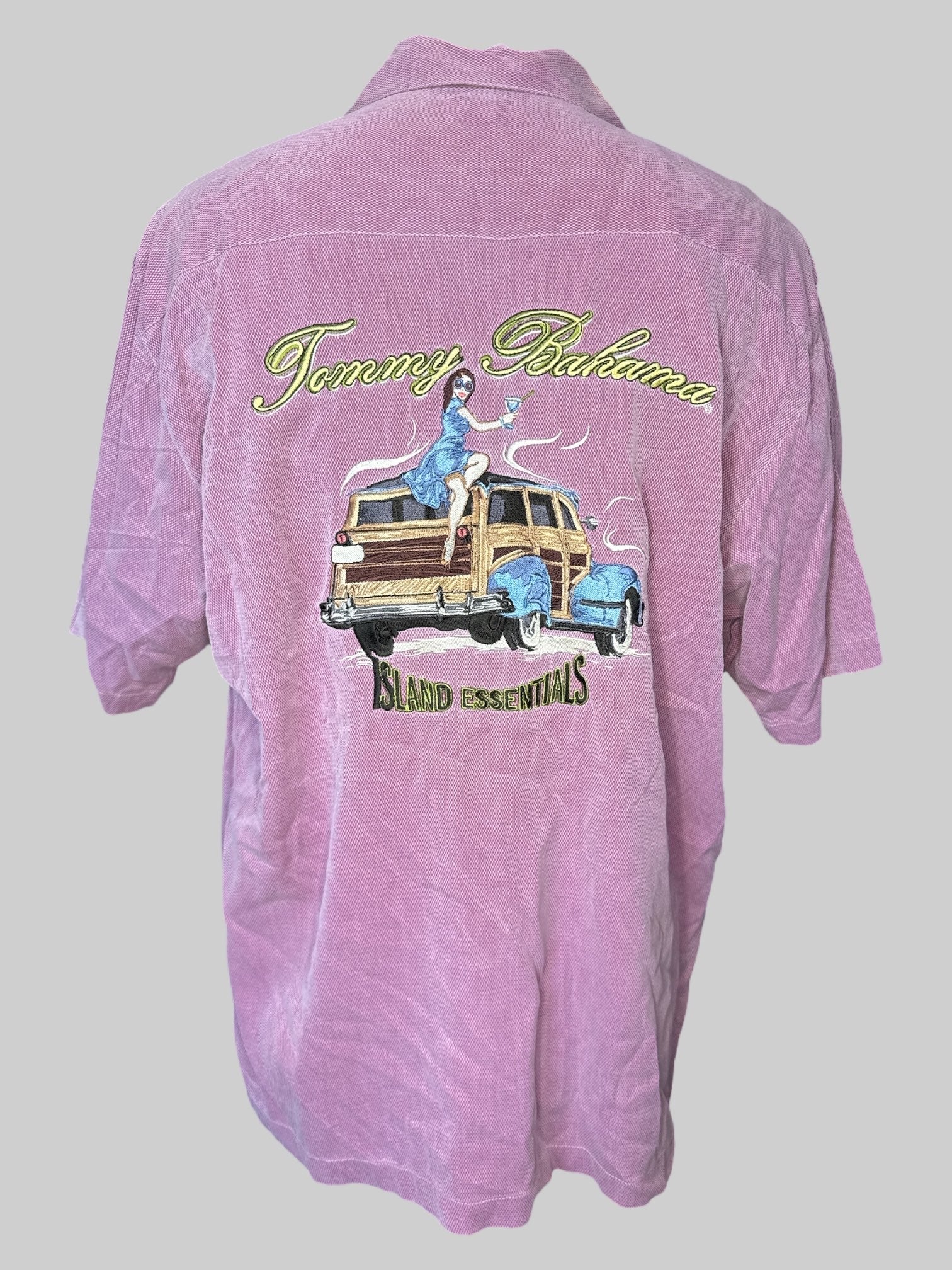 XL Pink short sleeve button down with pocket, wooden buttons, and “ Tommy Bahama island essentials” embroidery on back