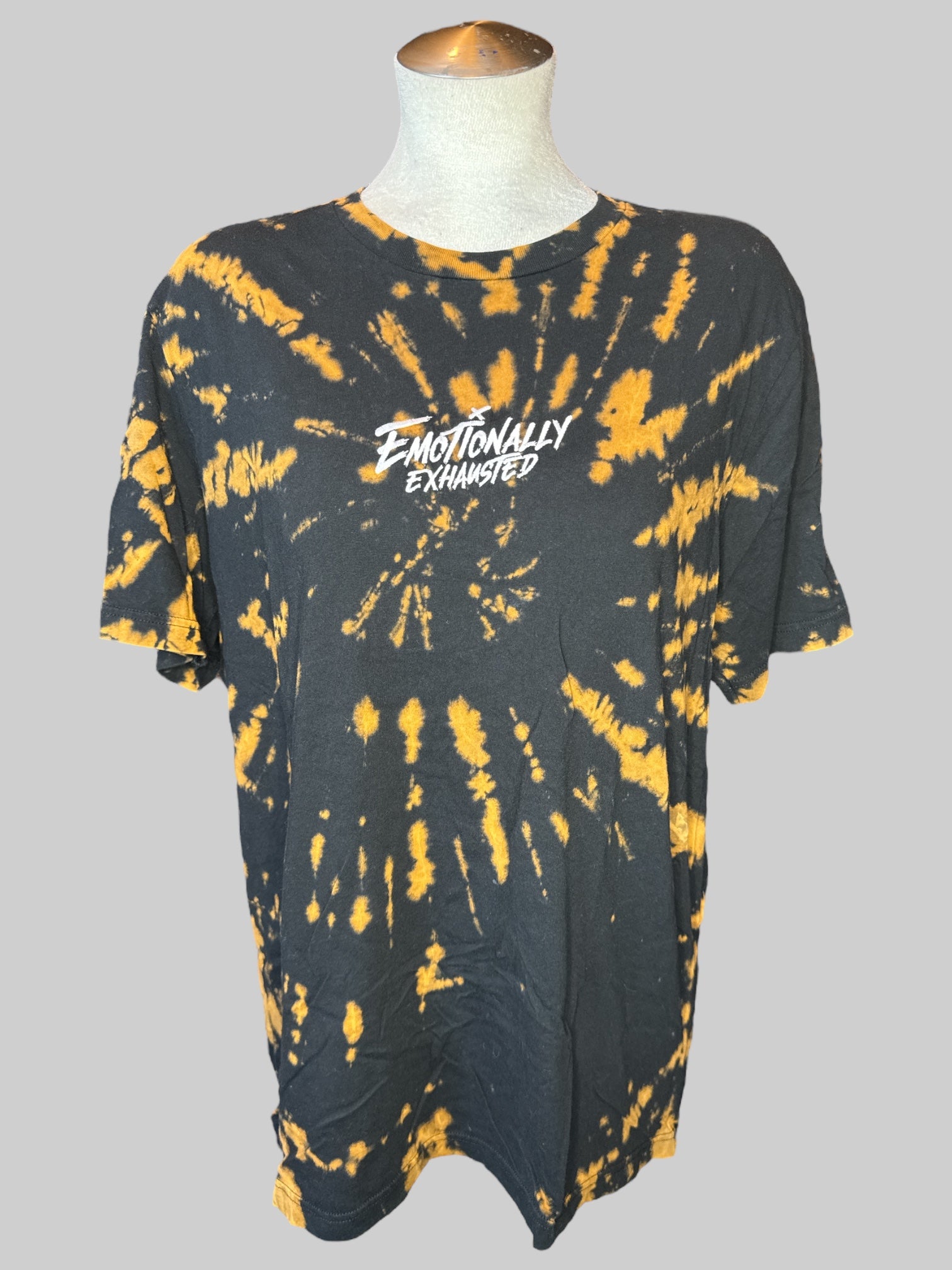 0X Black and brown tie-dye tee with “Emotionally exhausted” embroidery