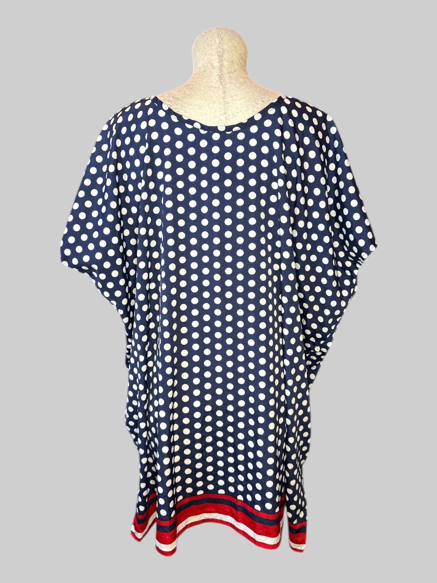 2X Navy blue kaftan with white polkadots and red white and blue stripes on bottom