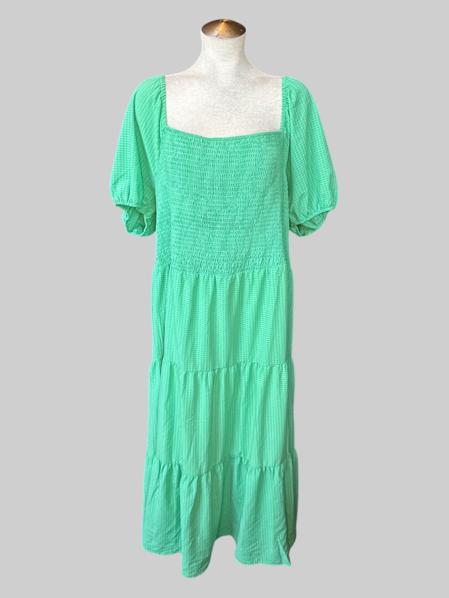 5X Light green tiered short sleeve dress with shirred bodice and back, and balloon sleeves