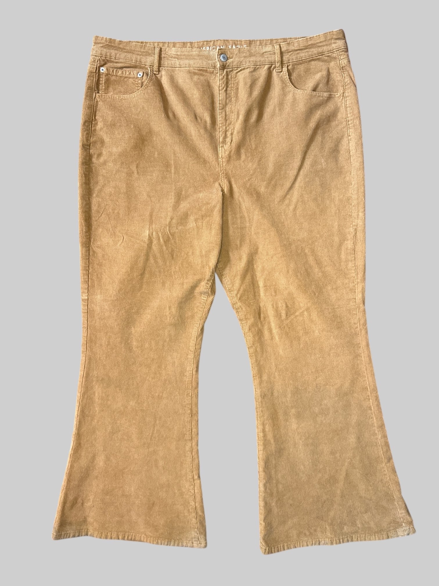 2X Brown corduroy pants with flared legs, pockets, and belt loops