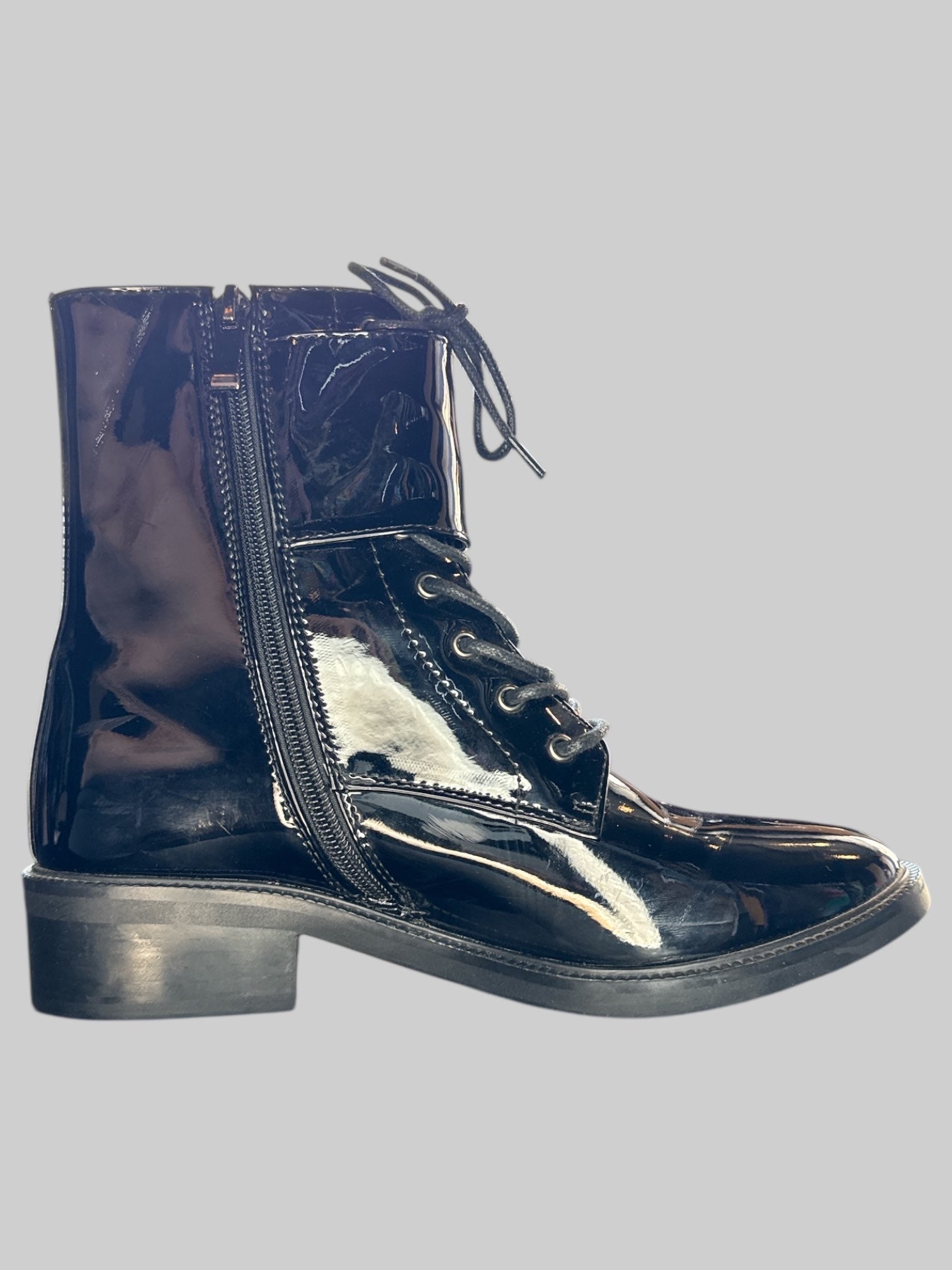 Size 7 Black vinyl boots with lacing, buckles, and zippers on sides