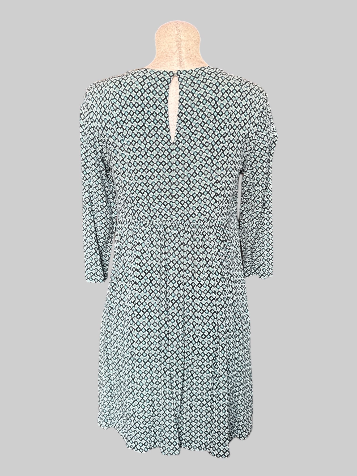 M Flowy blue, green, black, and white geometric pattern dress with quarter sleeves and keyhole back