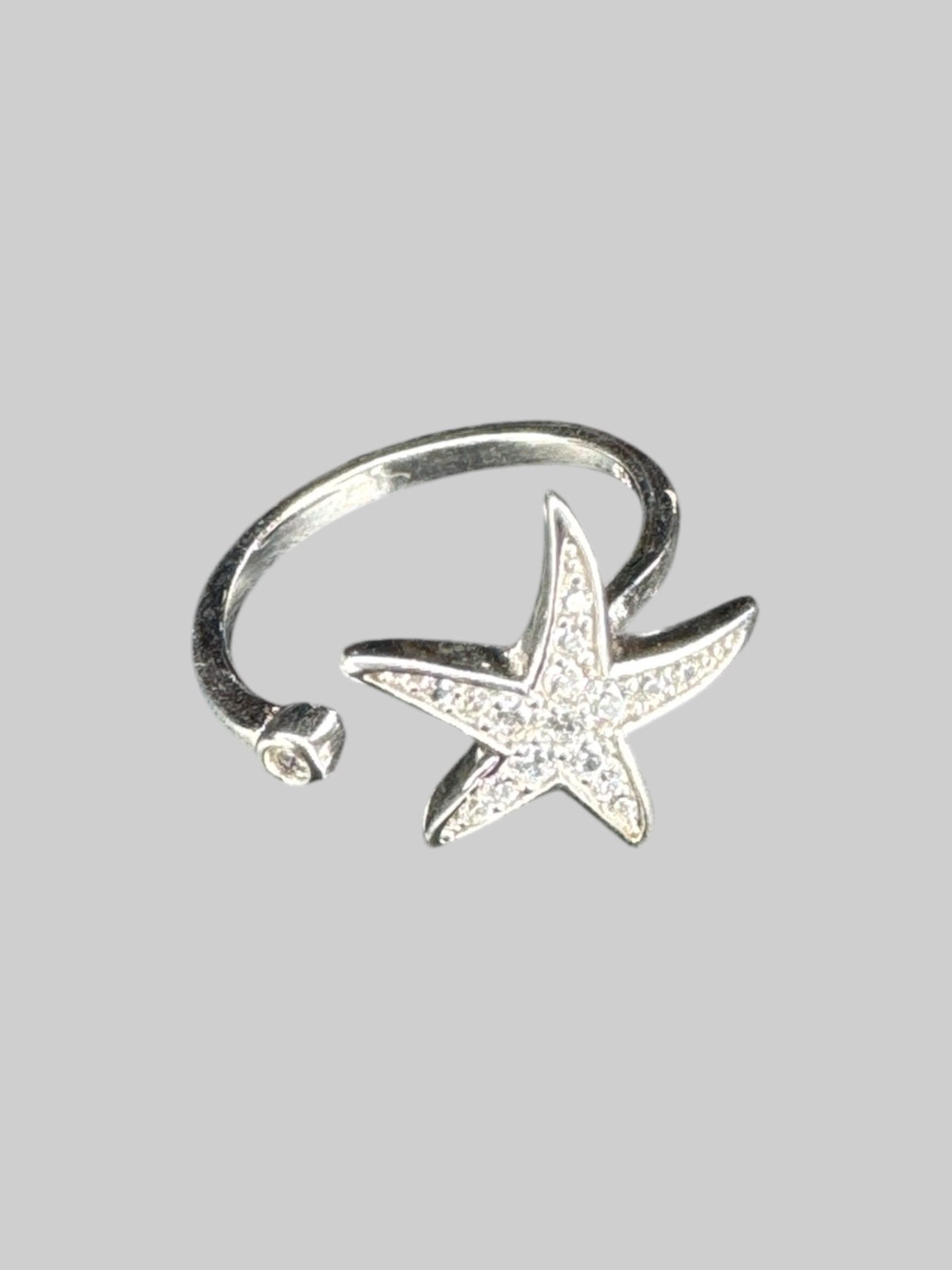 Adjustable silver ring with starfish