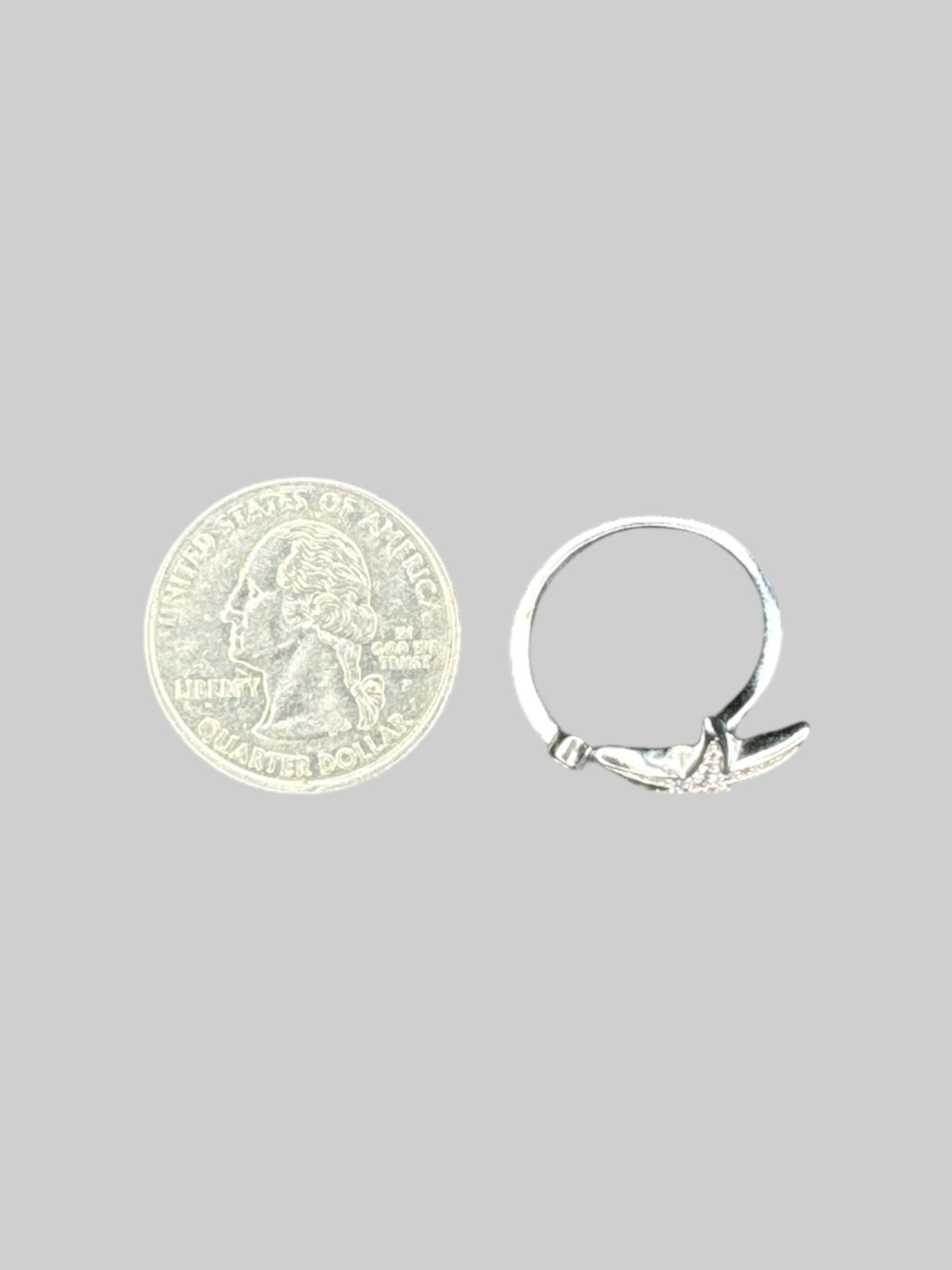 Adjustable silver ring with starfish