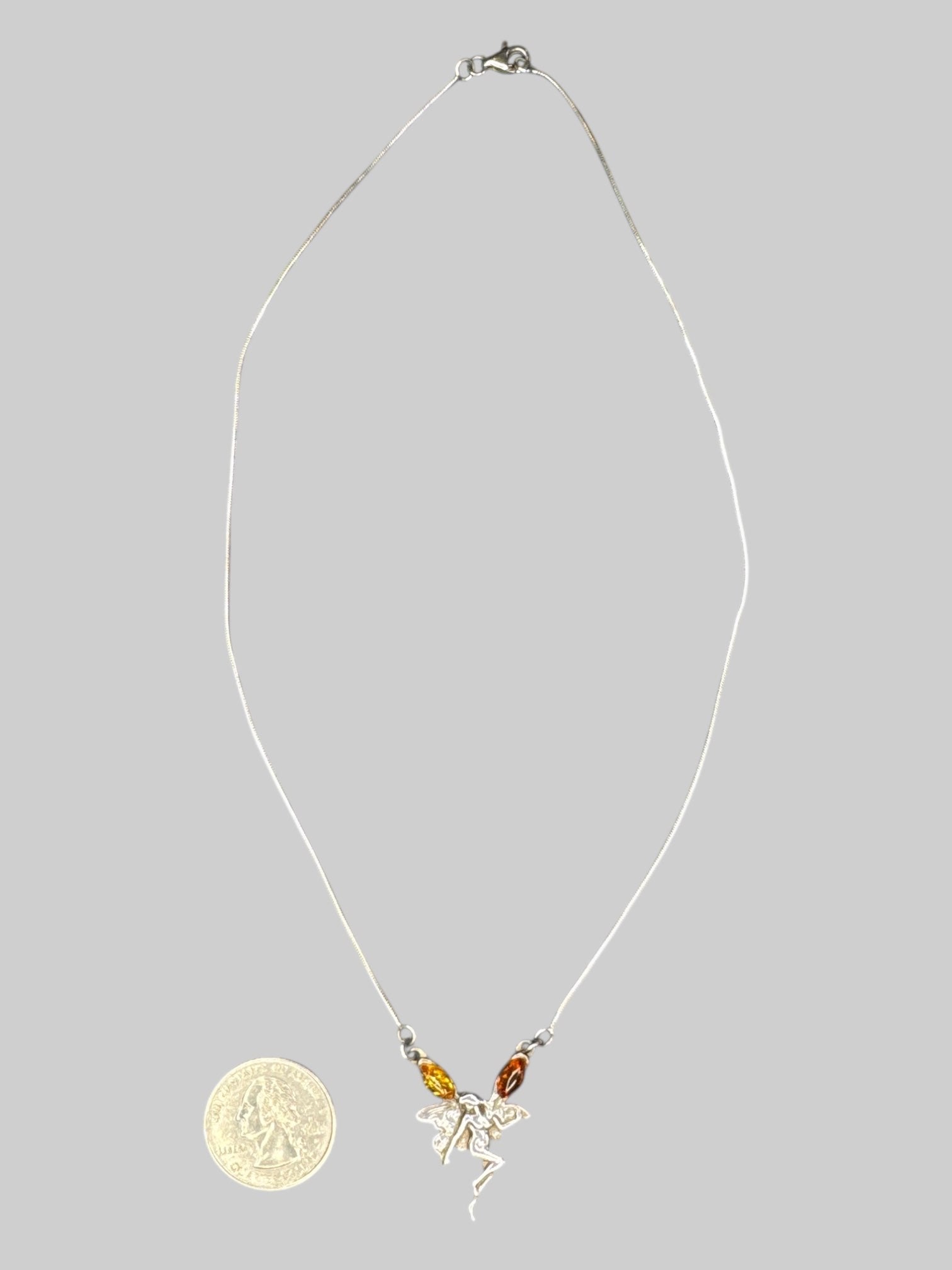 Sterling silver fairy necklace with orange and red stones