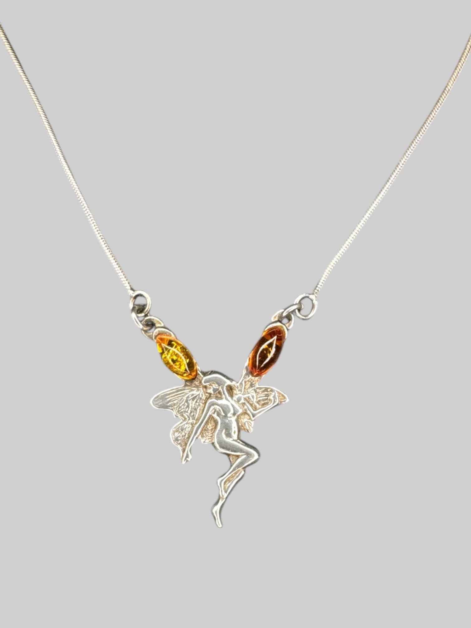 Sterling silver fairy necklace with orange and red stones