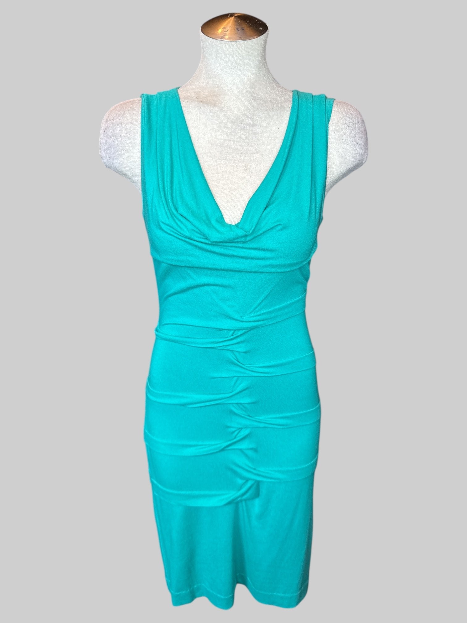 L Turquoise sleeveless body con dress with cinched design on front and back