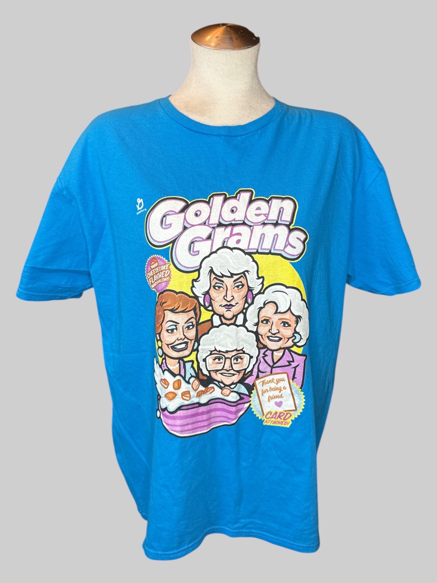 XL Blue tee with “Golden Grams” graphic