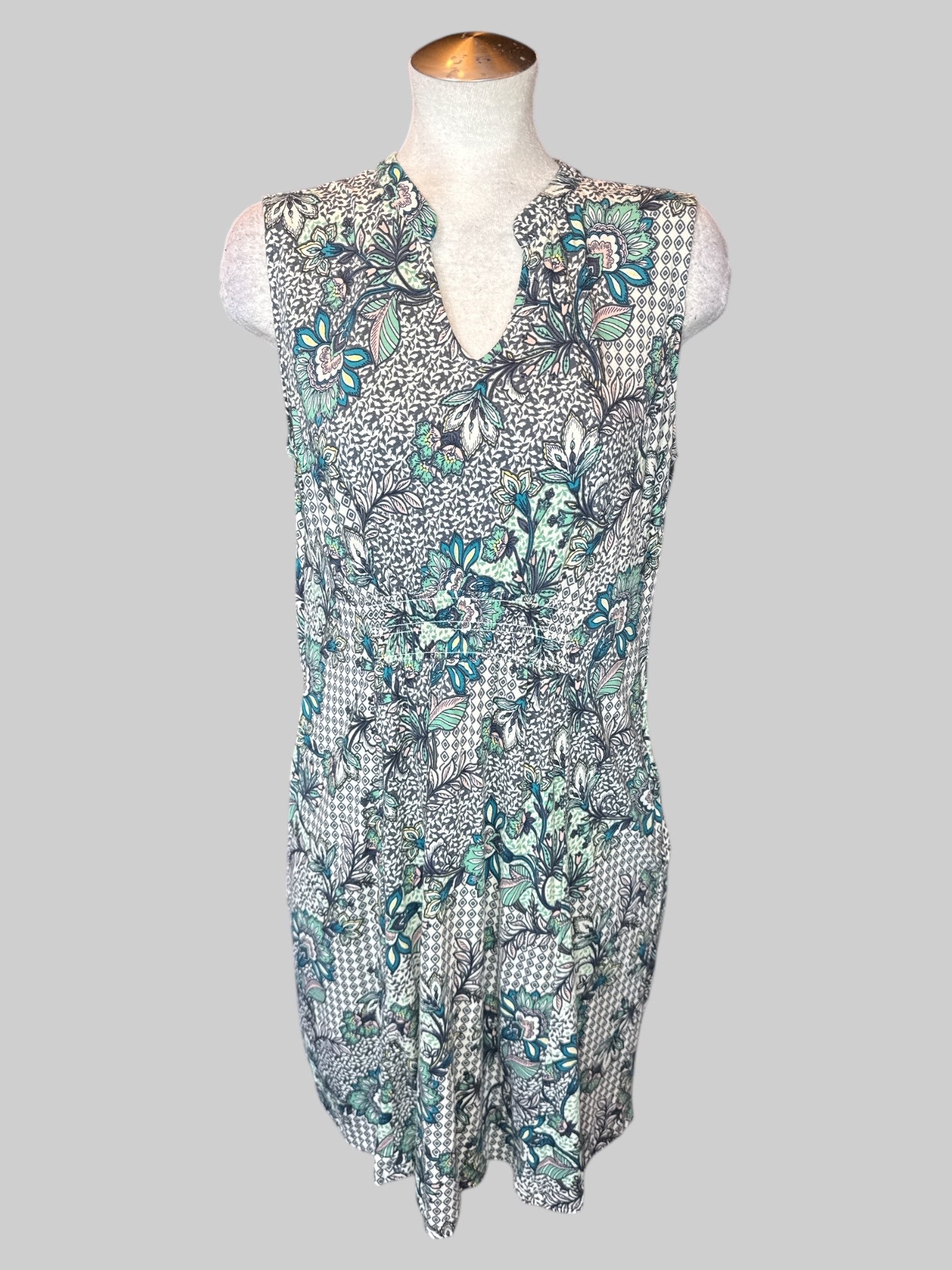 XL Off-white sleeveless dress with multicolor multi-pattern design, shirred waist panels on front and back, and pockets