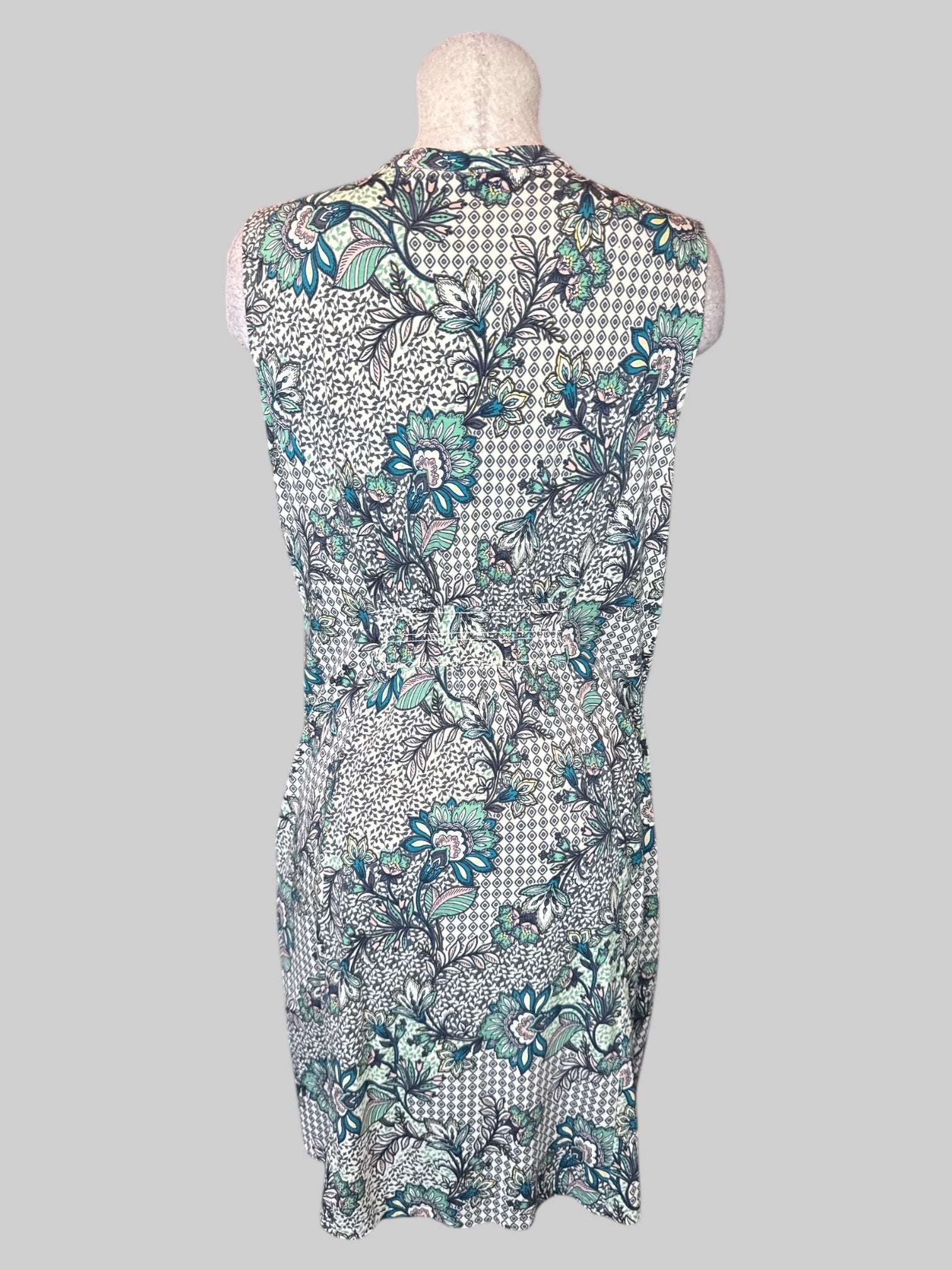 XL Off-white sleeveless dress with multicolor multi-pattern design, shirred waist panels on front and back, and pockets