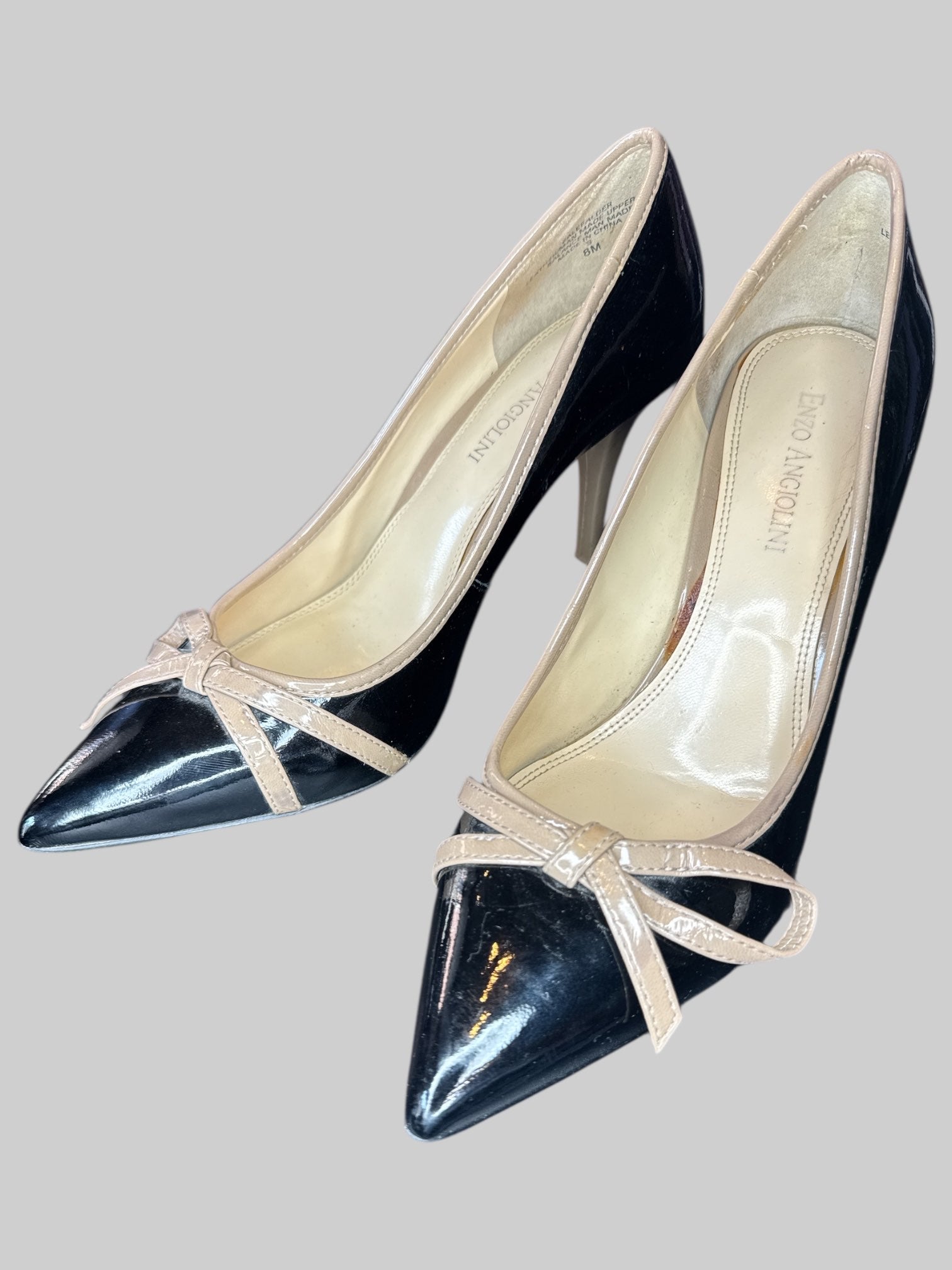 Size 8 Enzo Angiolini leather black bow tie heels with some scuff marks