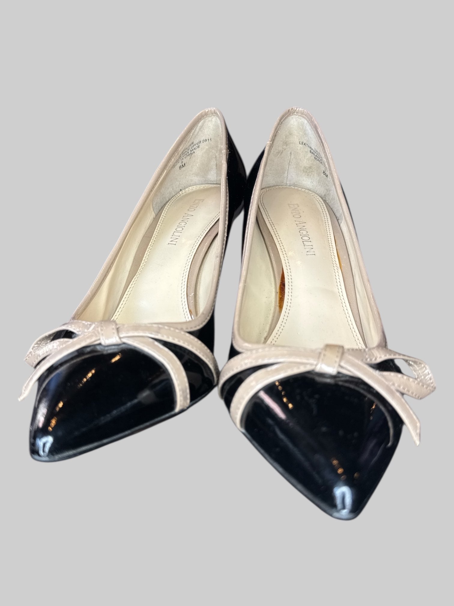 Size 8 Enzo Angiolini leather black bow tie heels with some scuff marks