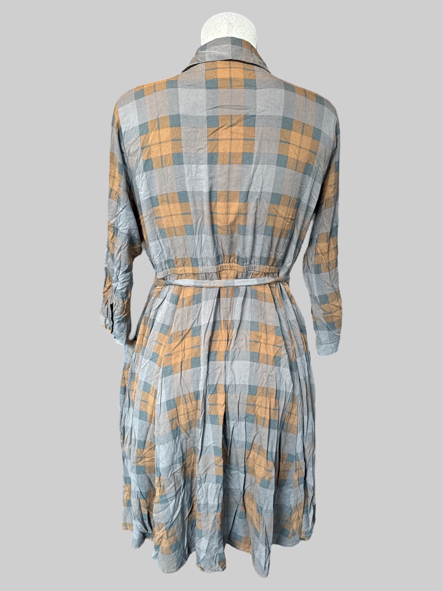 1X Brown and orange plaid button down dress with pockets on front and sides, elastic waist, and tie belt