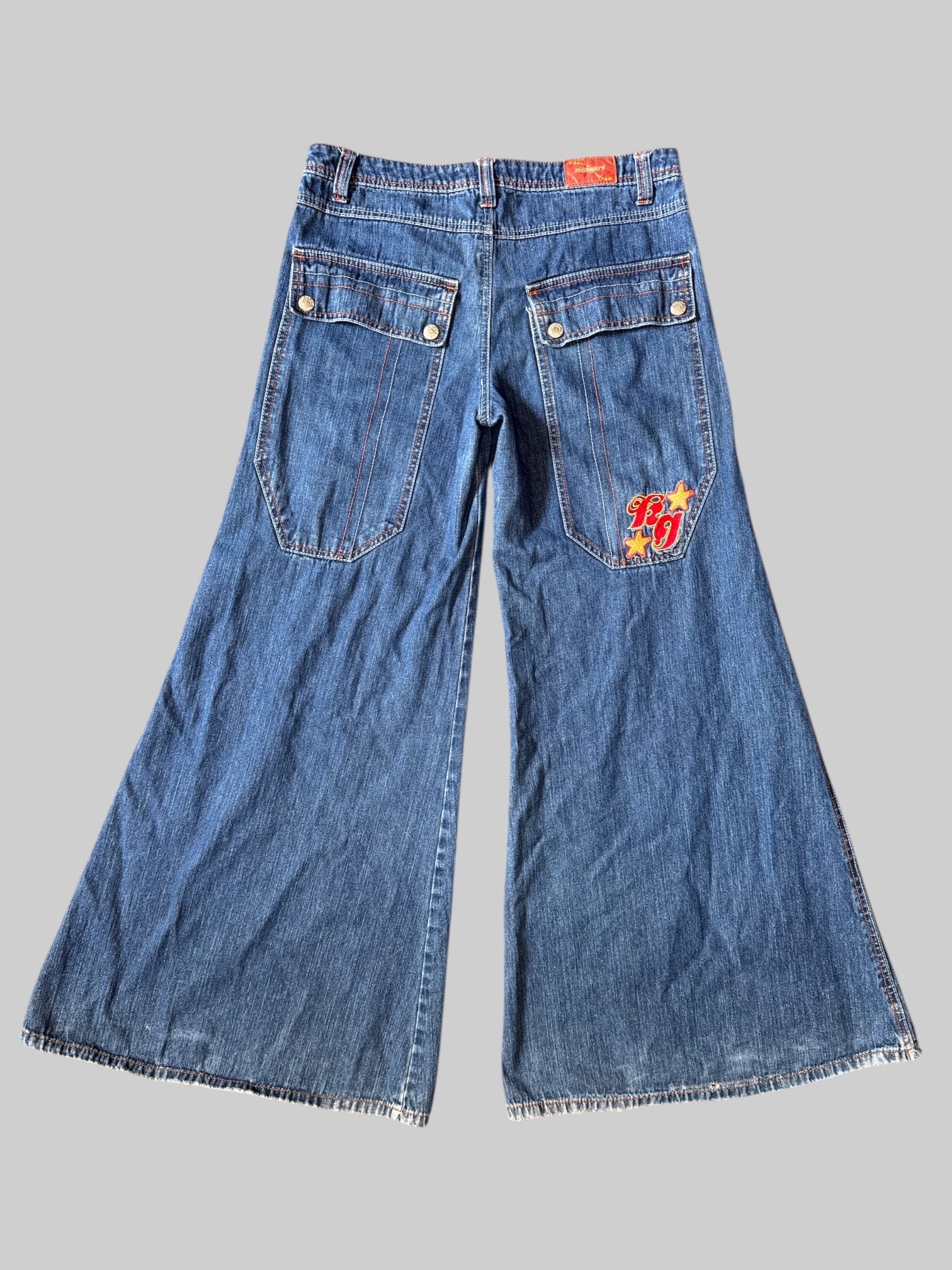 L Vintage blue Kikgirl jeans with orange stitching, flared legs, and large back pockets