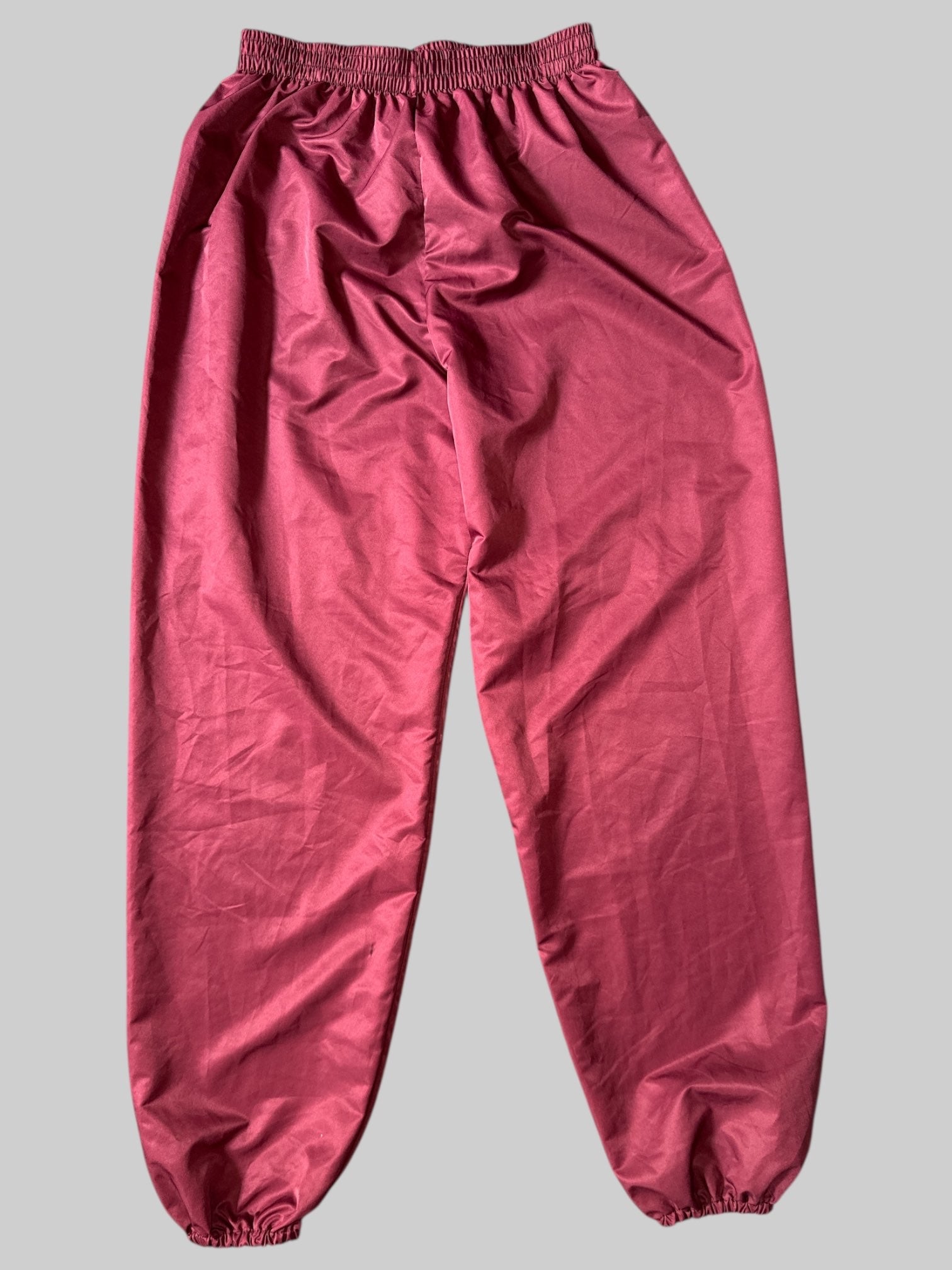 M Maroon pants with stretchy waist, and leg cuffs