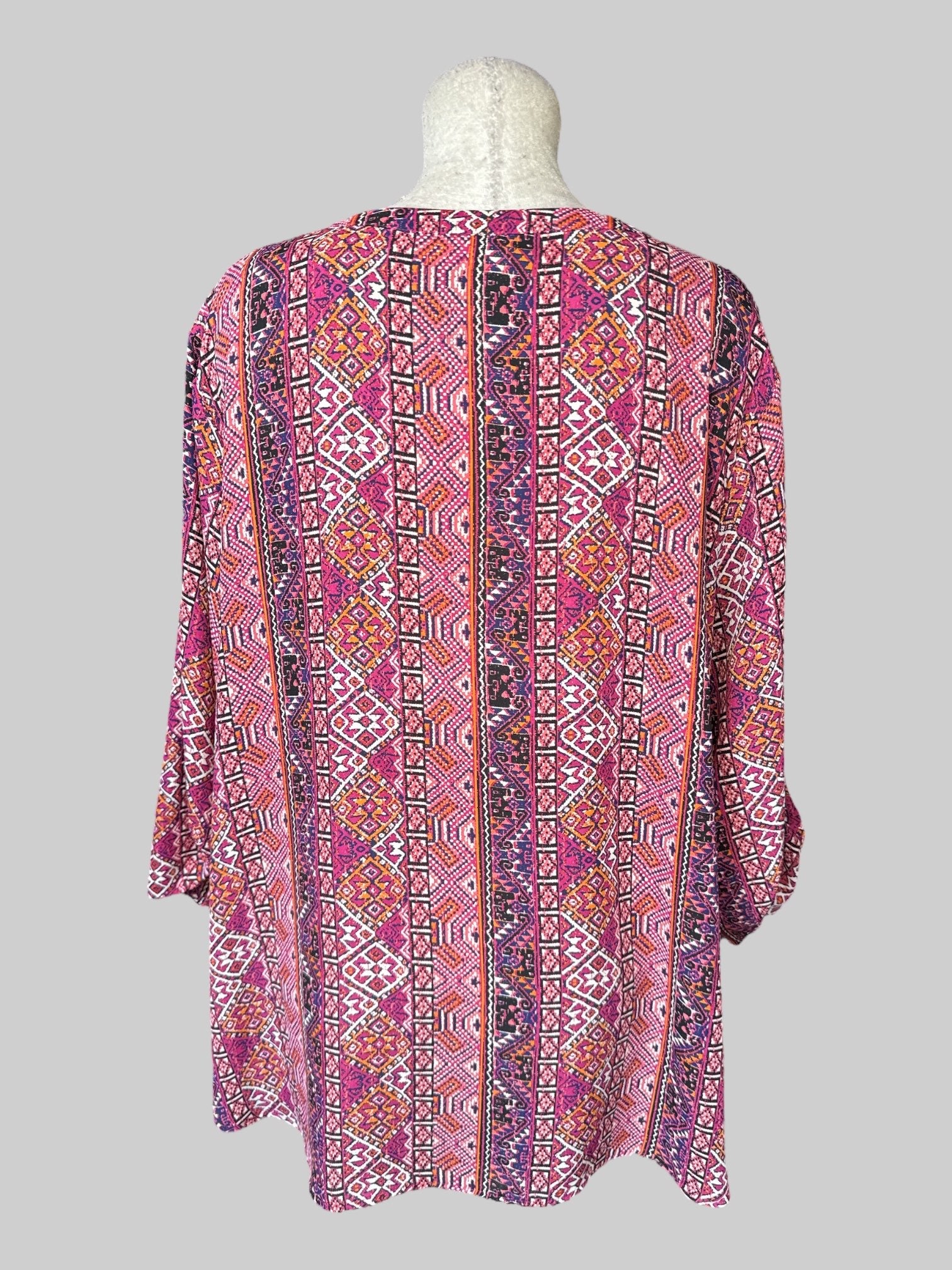 3X Multicolored geometric pattern top with lacing on neckline, and roll up sleeves