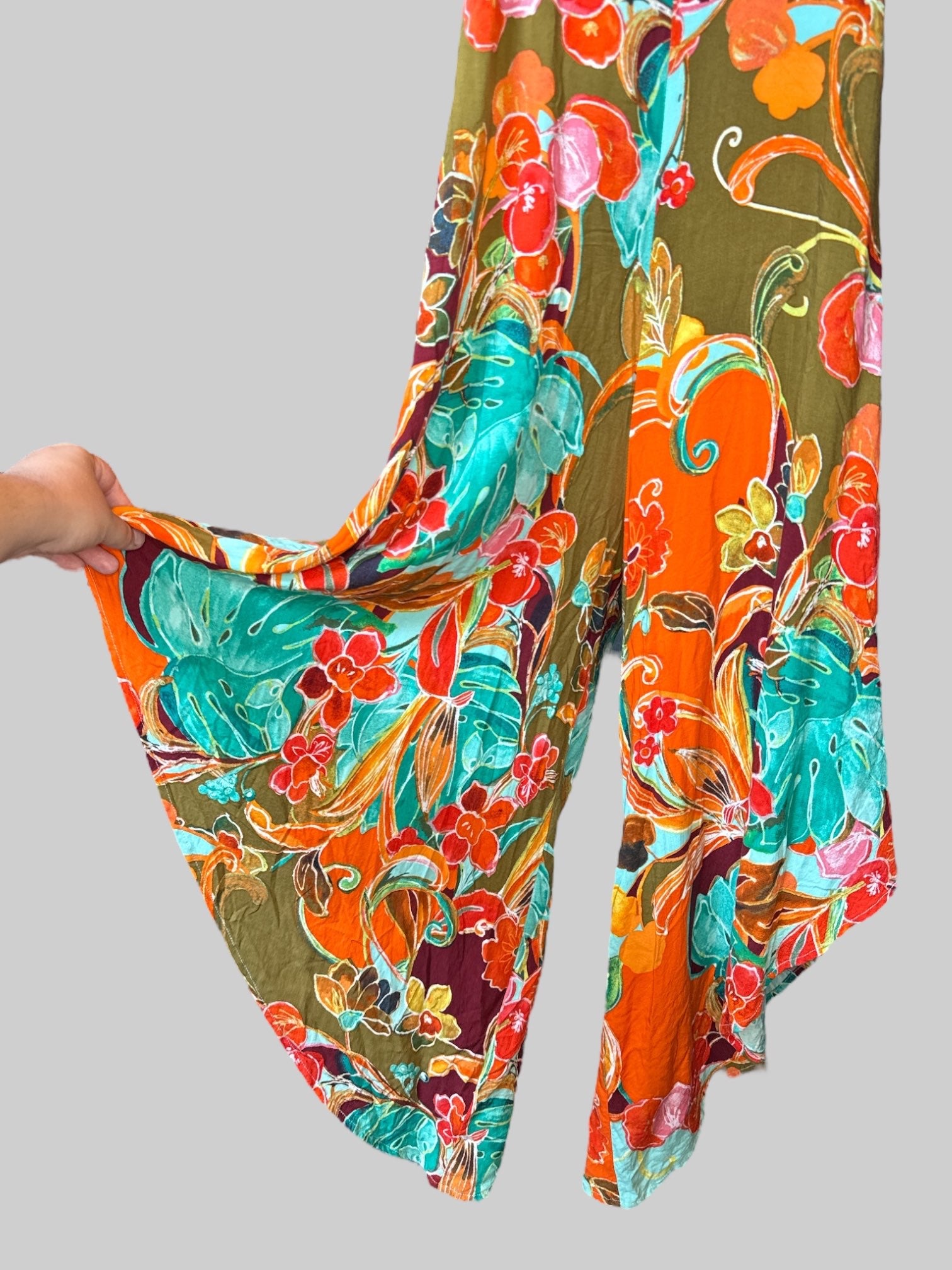 XL Multicolor floral romper that looks like dress, zipper on side, and strap detail on back