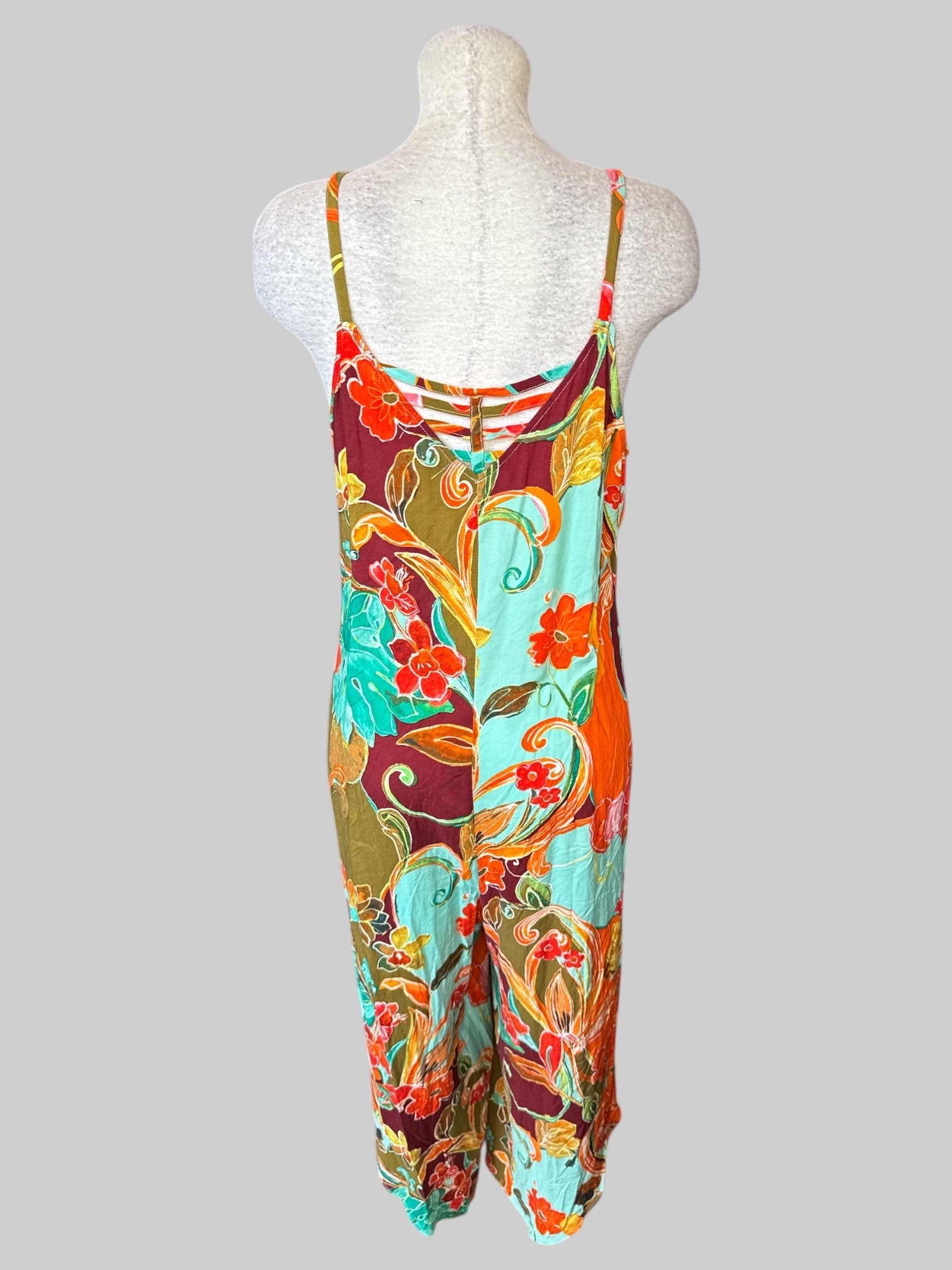 XL Multicolor floral romper that looks like dress, zipper on side, and strap detail on back