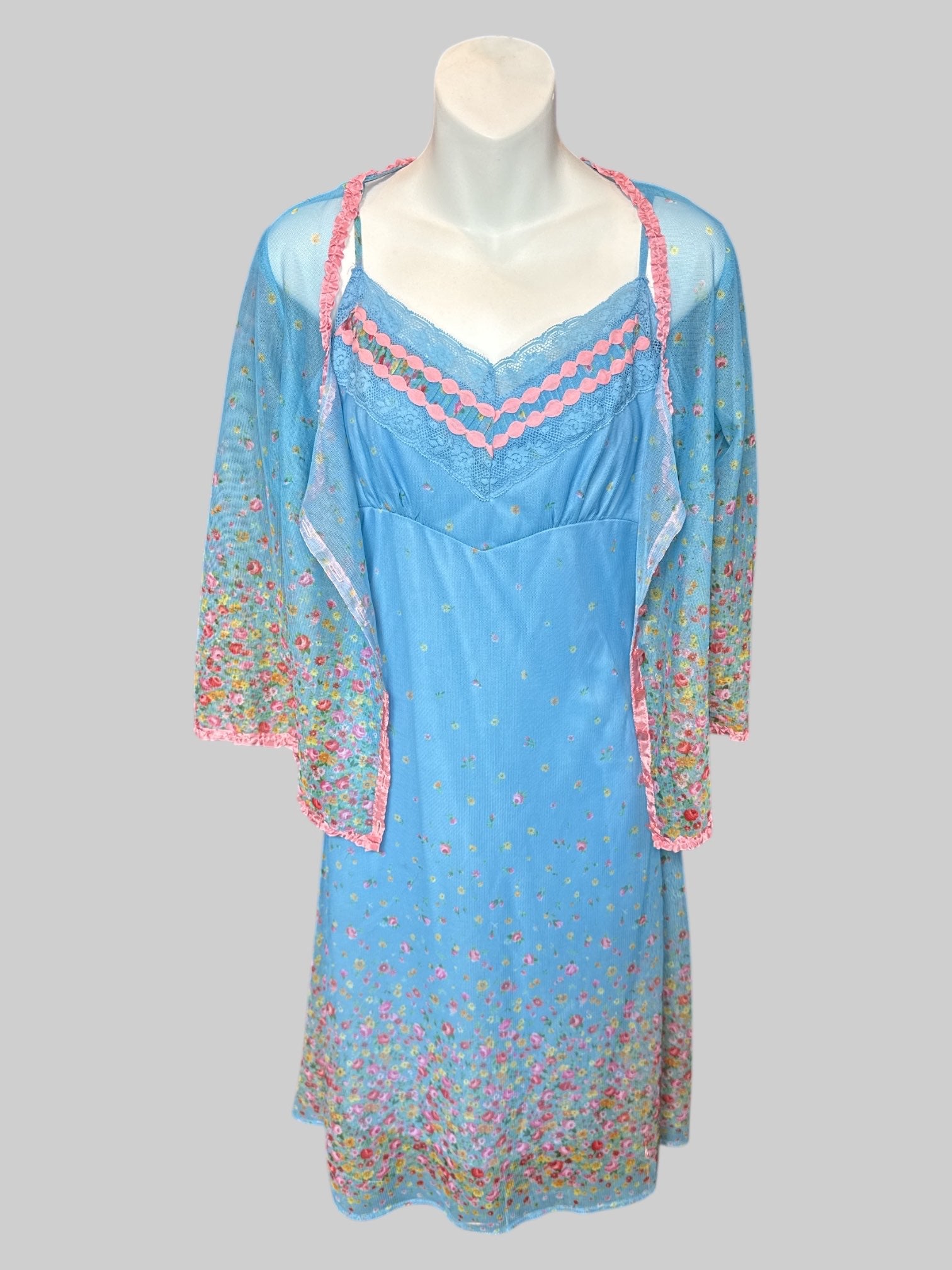 S Light blue floral sheer dress and cardigan; dress with zipper on side and lining, cardigan with pink ruffle, neckline and hems