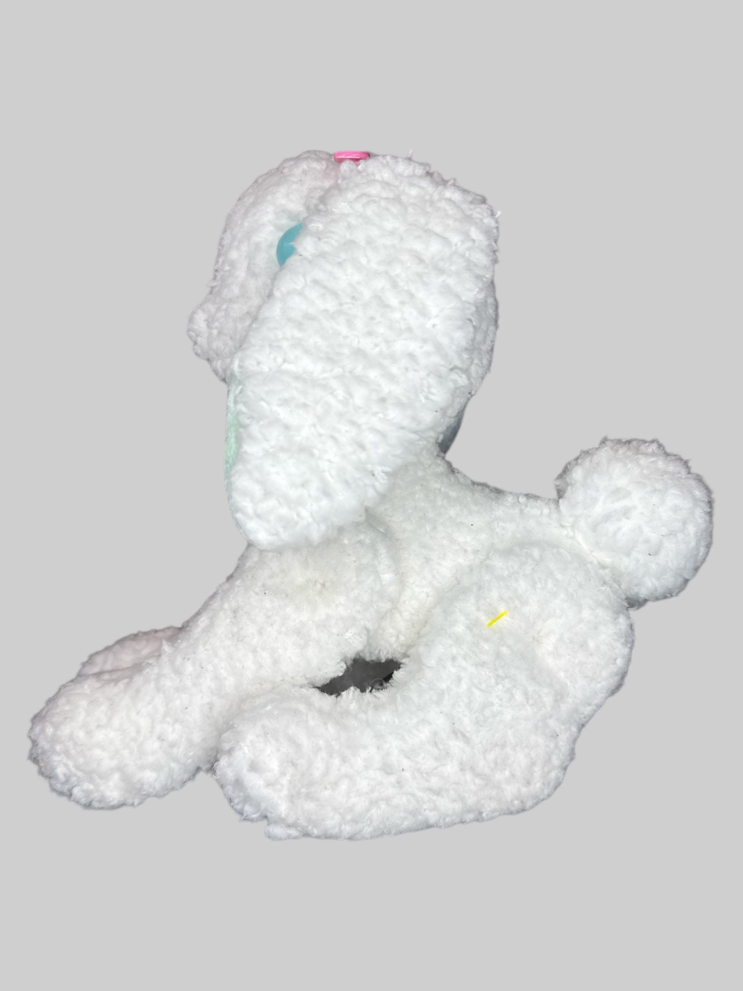 Handmaid white bunny plush with pink heart on chest, blue eyes, and pink hearts near ears